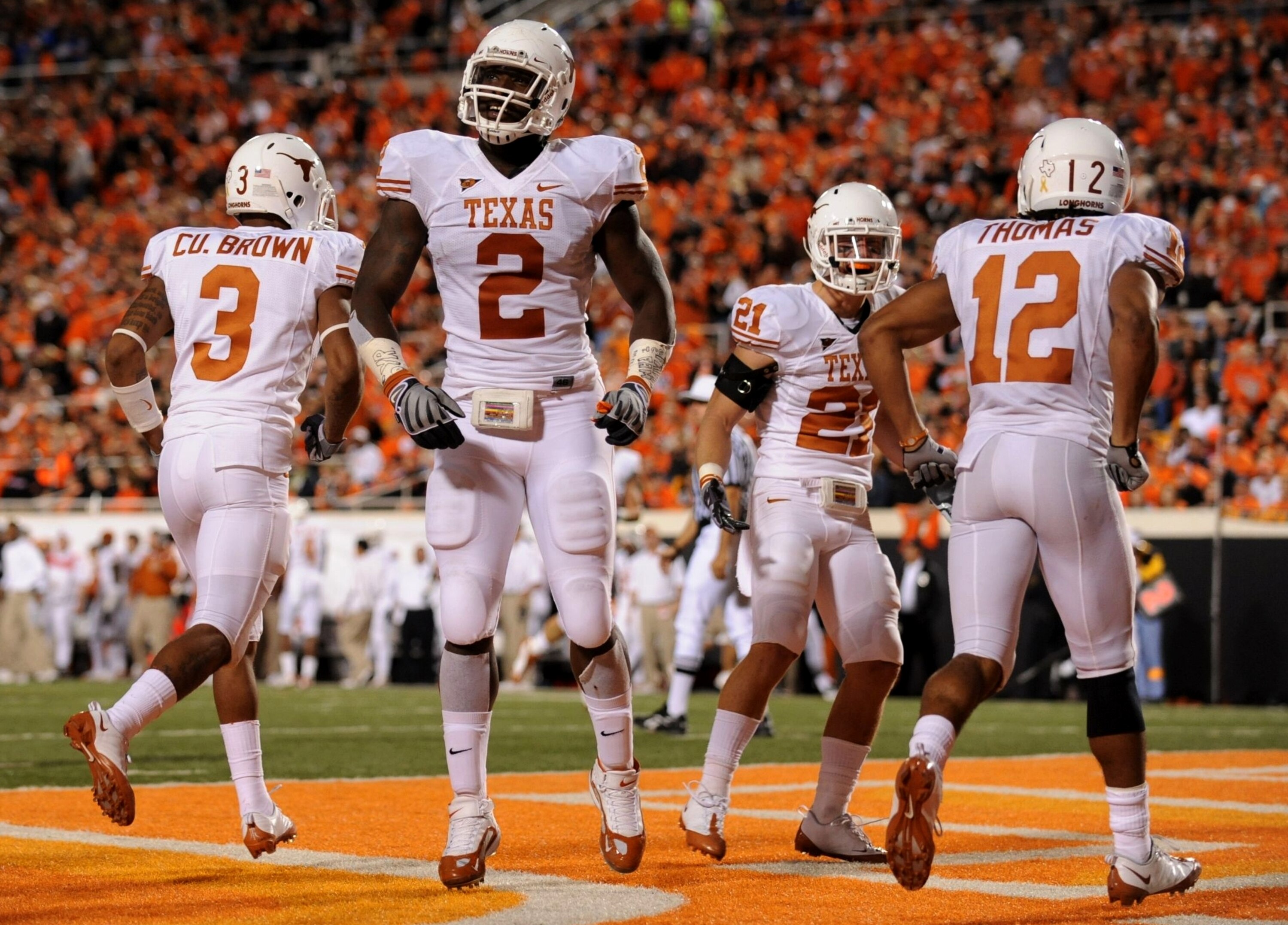 STILLWATER, OK - OCTOBER 31:  Earl Thomas #12 Sergio Kindle #2 of the Texas Longhorns celebrates a touchdown scored by teammate Earl Thomas #12 (R) on an interception in the third quarter against the Oklahoma State Cowboys at Boone Pickens Stadium on Octo