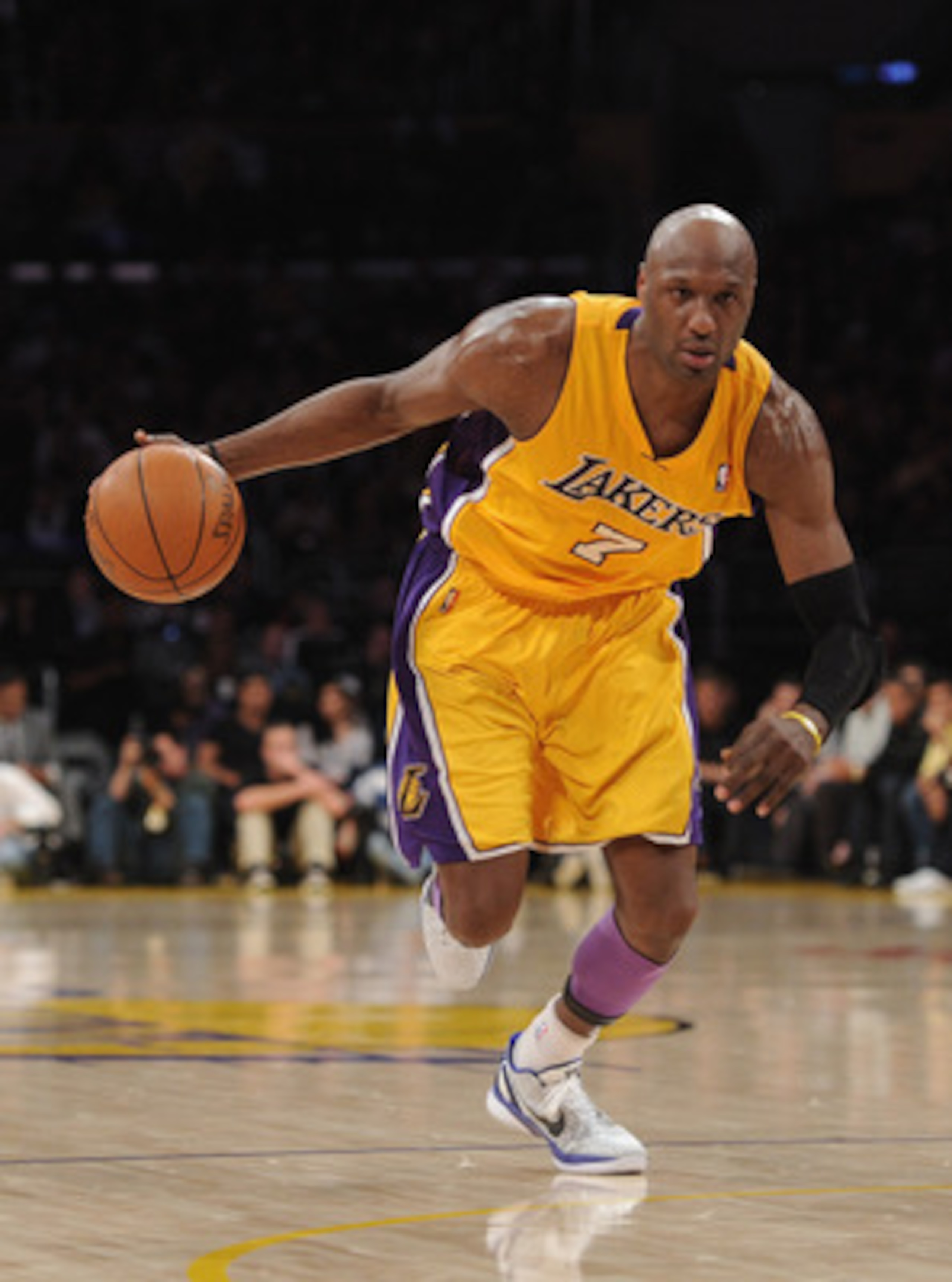 LOS ANGELES, CA - APRIL 12:  Lamar Odom #7 of the Los Angeles Lakers drives against the San Antonio Spurs during the game at Staples Center on April 12, 2011 in Los Angeles, California.  NOTE TO USER: User expressly acknowledges and agrees that, by downlo