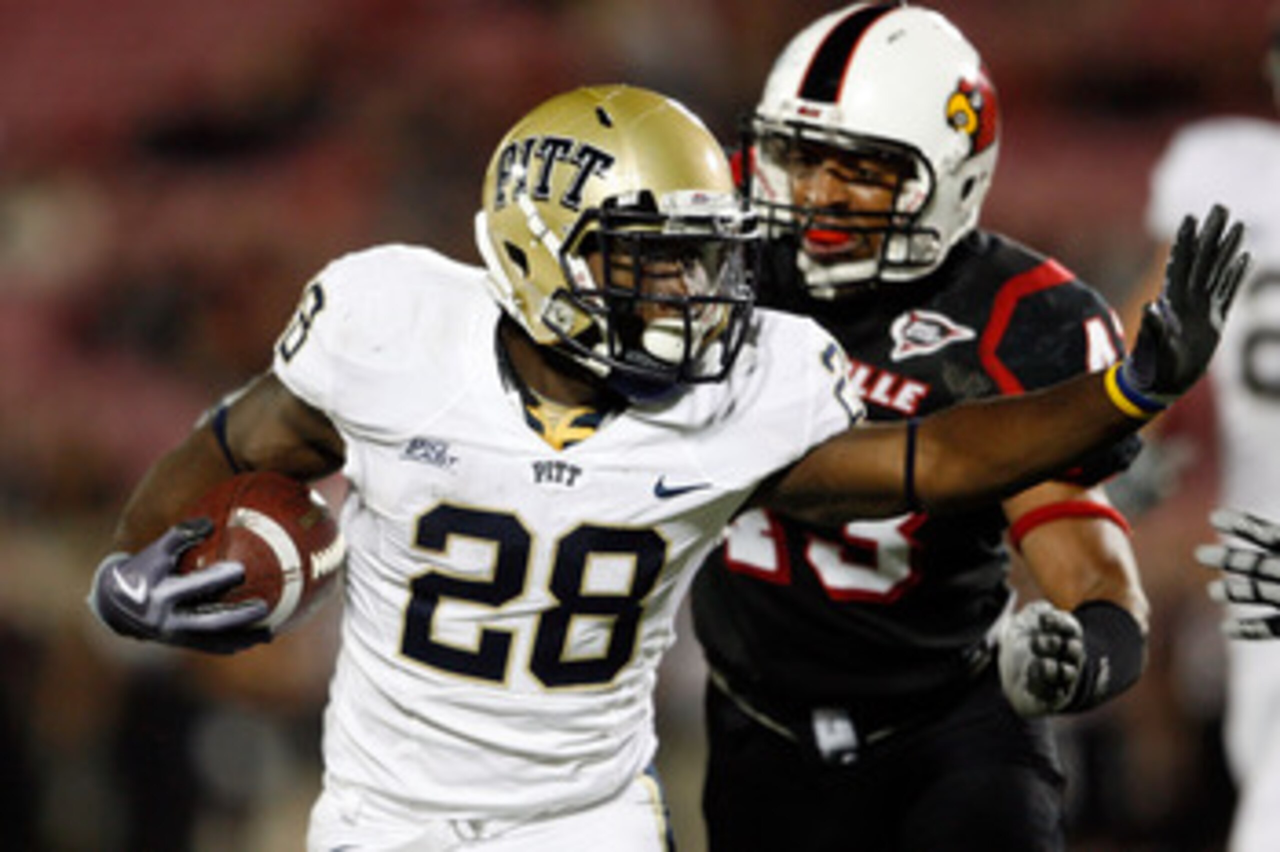 LOUISVILLE, KY - OCTOBER 02:  Dion Lewis #28 of the Pittsburgh Panthers runs with the ball during the Big East Conference game against the Louisville Cardinals  at Papa John's Cardinal Stadium on October 2, 2009 in Louisville, Kentucky.  Pittsburgh won 35