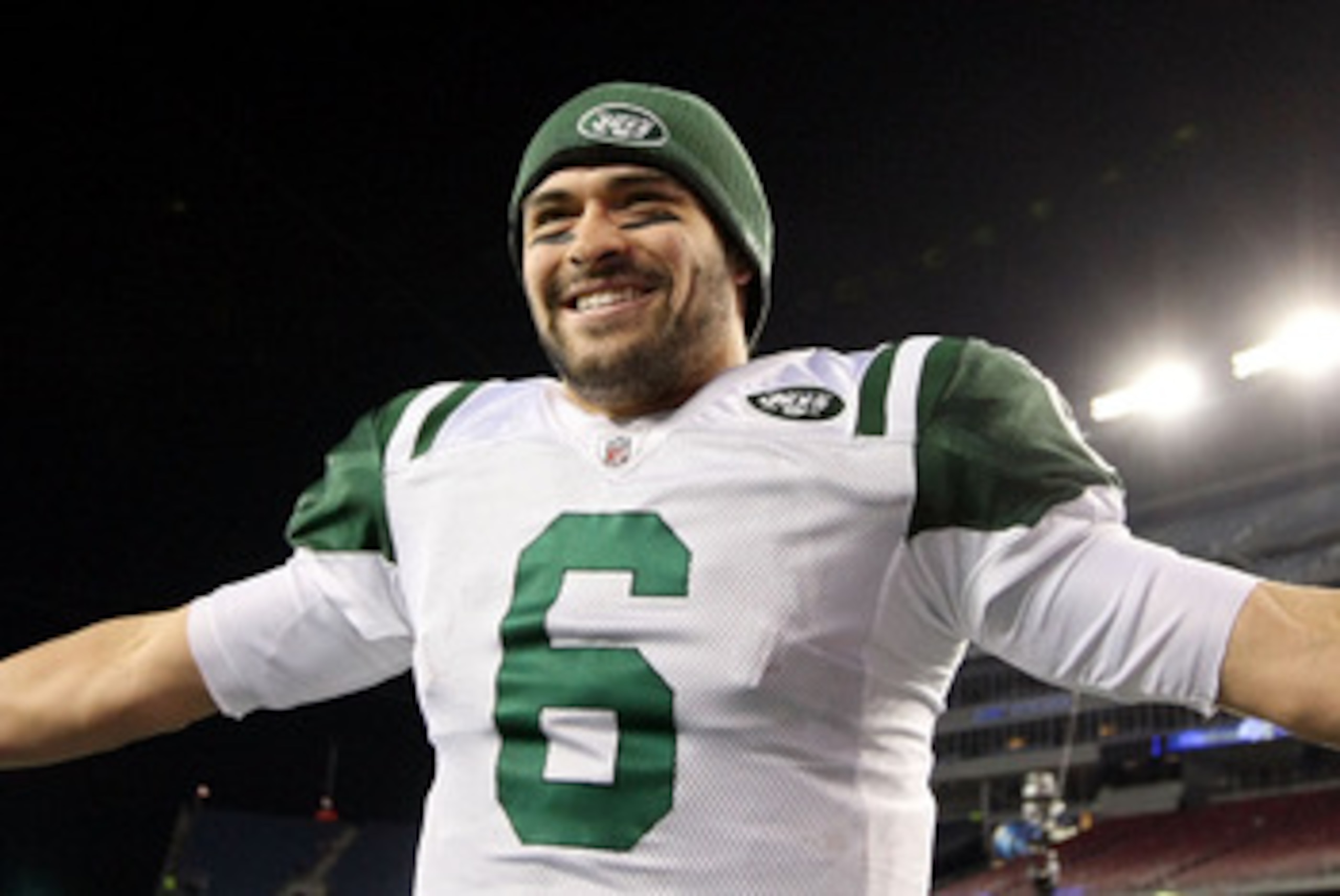 FOXBORO, MA - JANUARY 16:  Mark Sanchez #6 of the New York Jets celebrates after the Jets defeated the Patriots 28 to 21 in their 2011 AFC divisional playoff game at Gillette Stadium on January 16, 2011 in Foxboro, Massachusetts.  (Photo by Al Bello/Getty