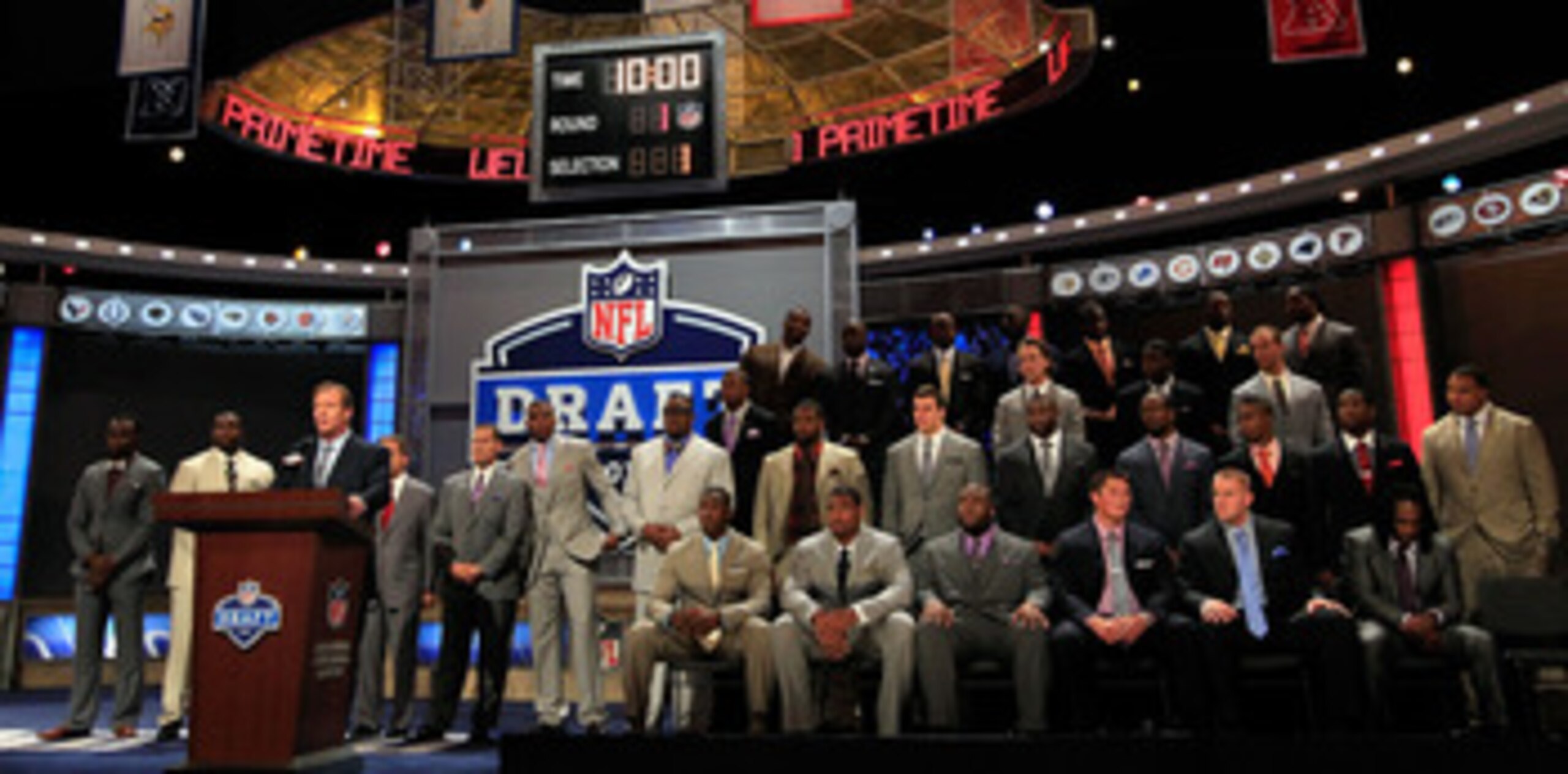 NEW YORK, NY - APRIL 28:  NFL Commissioner Roger Goodell leads a moment of silence for the victims of the storms and tornados which struck Alamaba on April 27 and is joined on stage by the members of the 2011 Draft class and the 2011 Pro Football Hall of 