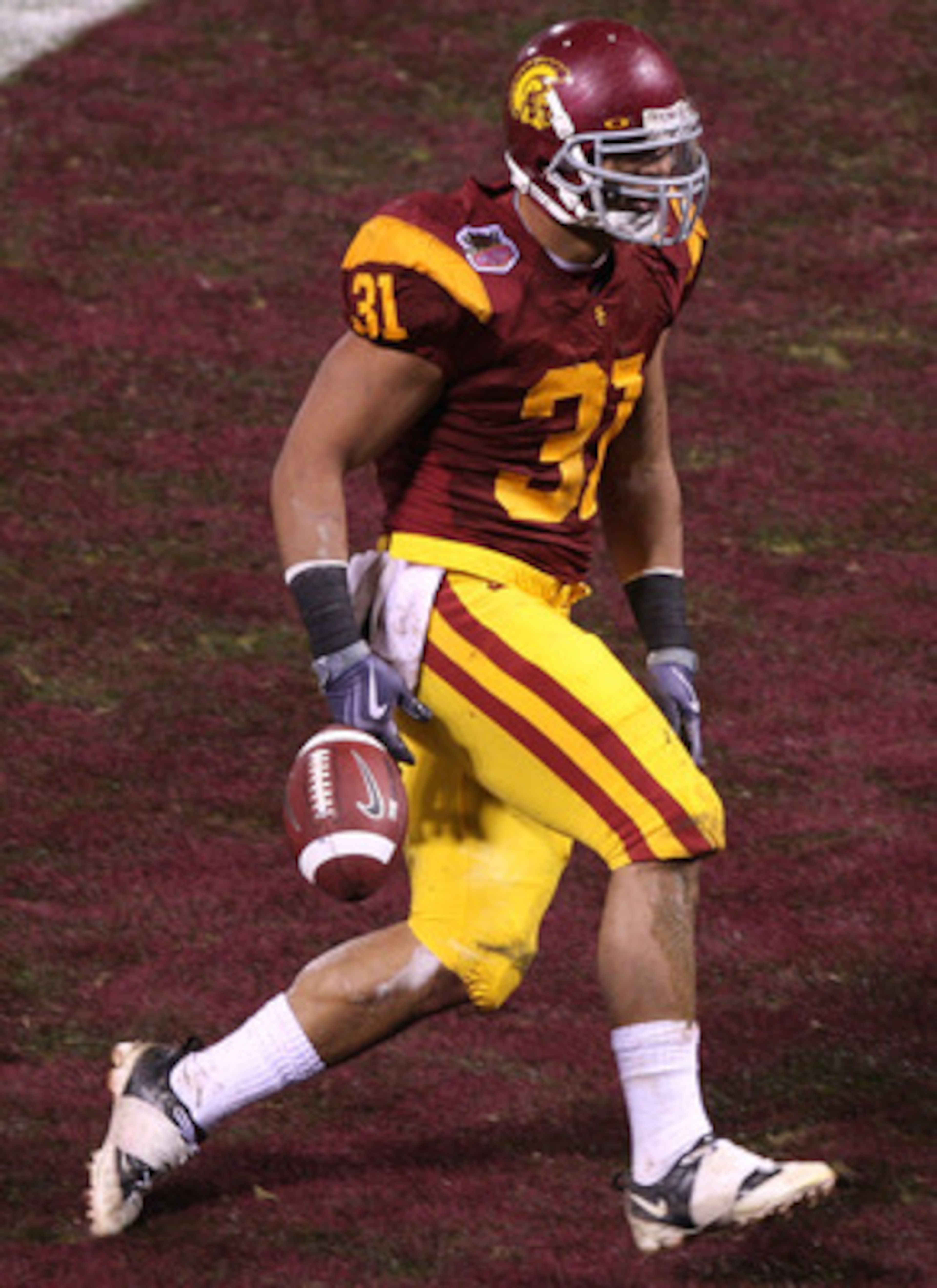 SAN FRANCISCO - DECEMBER 26: Stanley Havili #31 of the USC Trojans celebrates after a touchdown in the first quarter against the Boston College Eagles during the 2009 Emerald Bowl at AT&T Park on December 26, 2009 in San Francisco, California. (Photo by J