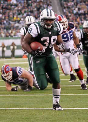 EAST RUTHERFORD, NJ - JANUARY 02:  John Conner #38 of the New York Jets runs for a touchdown against the Buffalo Bills at New Meadowlands Stadium on January 2, 2011 in East Rutherford, New Jersey.  (Photo by Al Bello/Getty Images)