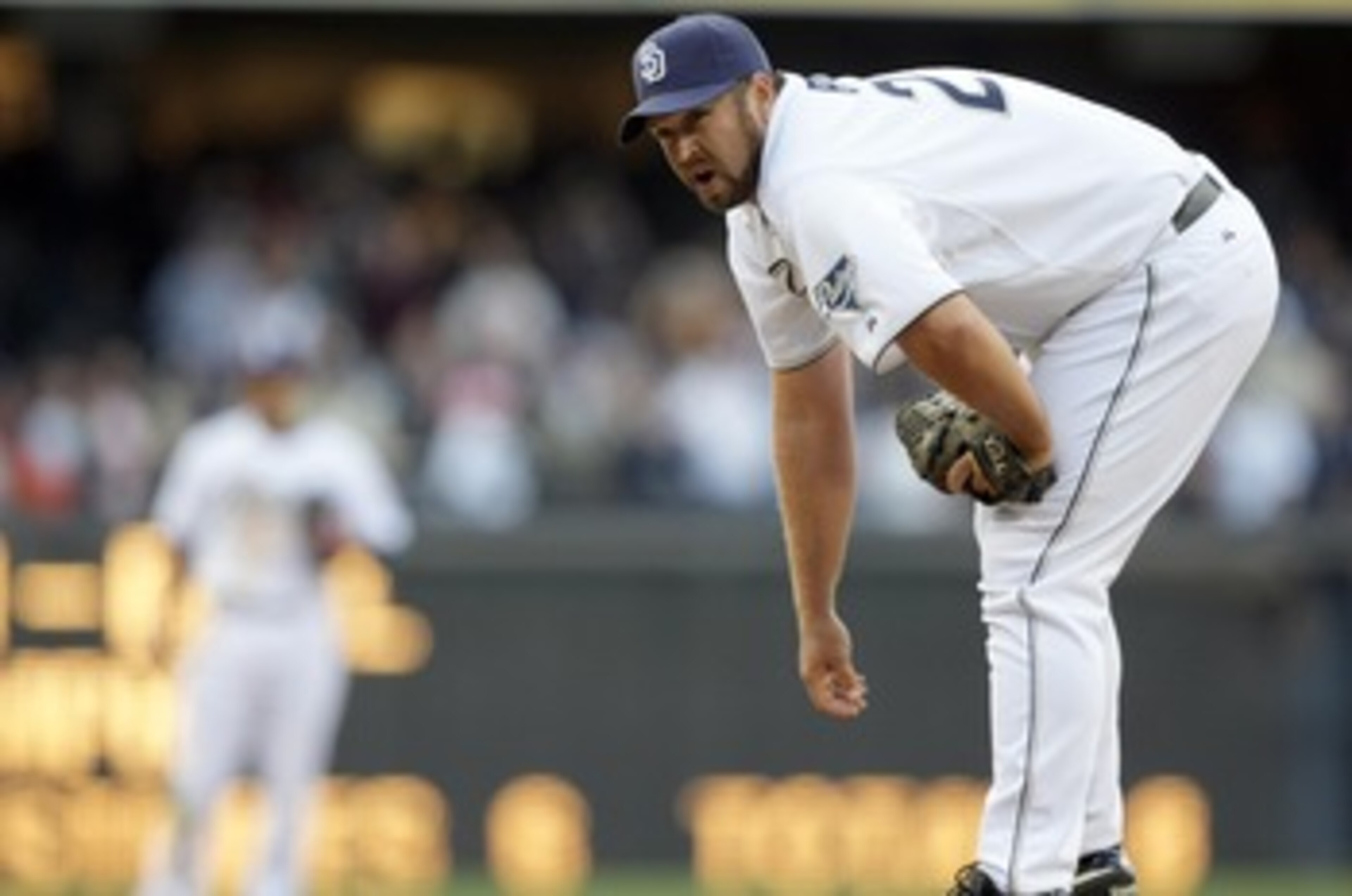 SAN DIEGO, CA - APRIL 5:  Closer Heath Bell #21 of the San Diego Padres looks on from the mound in the 9th inning against the San Francisco Giants during their MLB Game at Petco Park on April 5, 2011 in San Diego, California. Bell got the save with the Pa