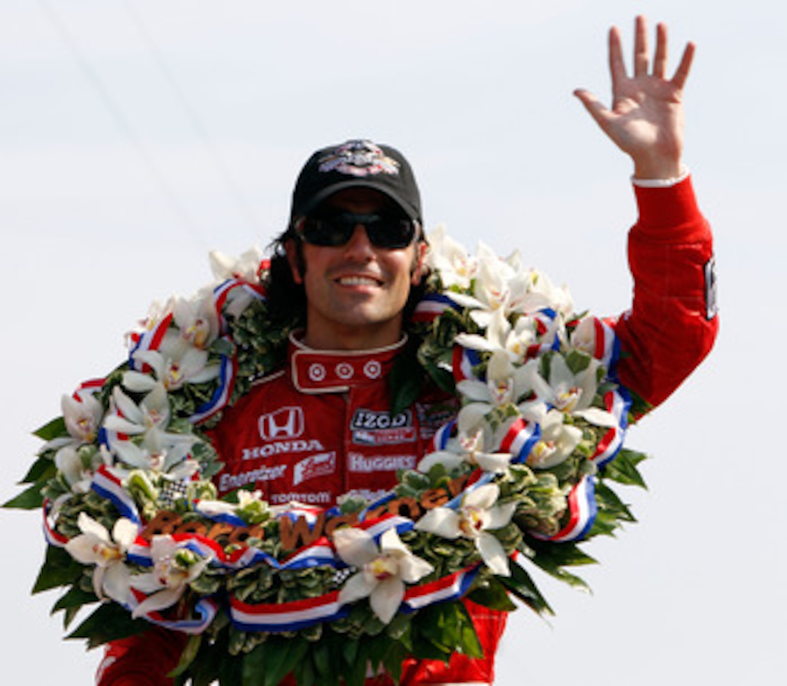 INDIANAPOLIS - MAY 30:  Dario Franchitti of Scotland, driver of the #10 Target Chip Ganassi Racing Dallara Honda, celebrates in victory circle after winning the IZOD IndyCar Series 94th running of the Indianapolis 500 at the Indianapolis Motor Speedway on