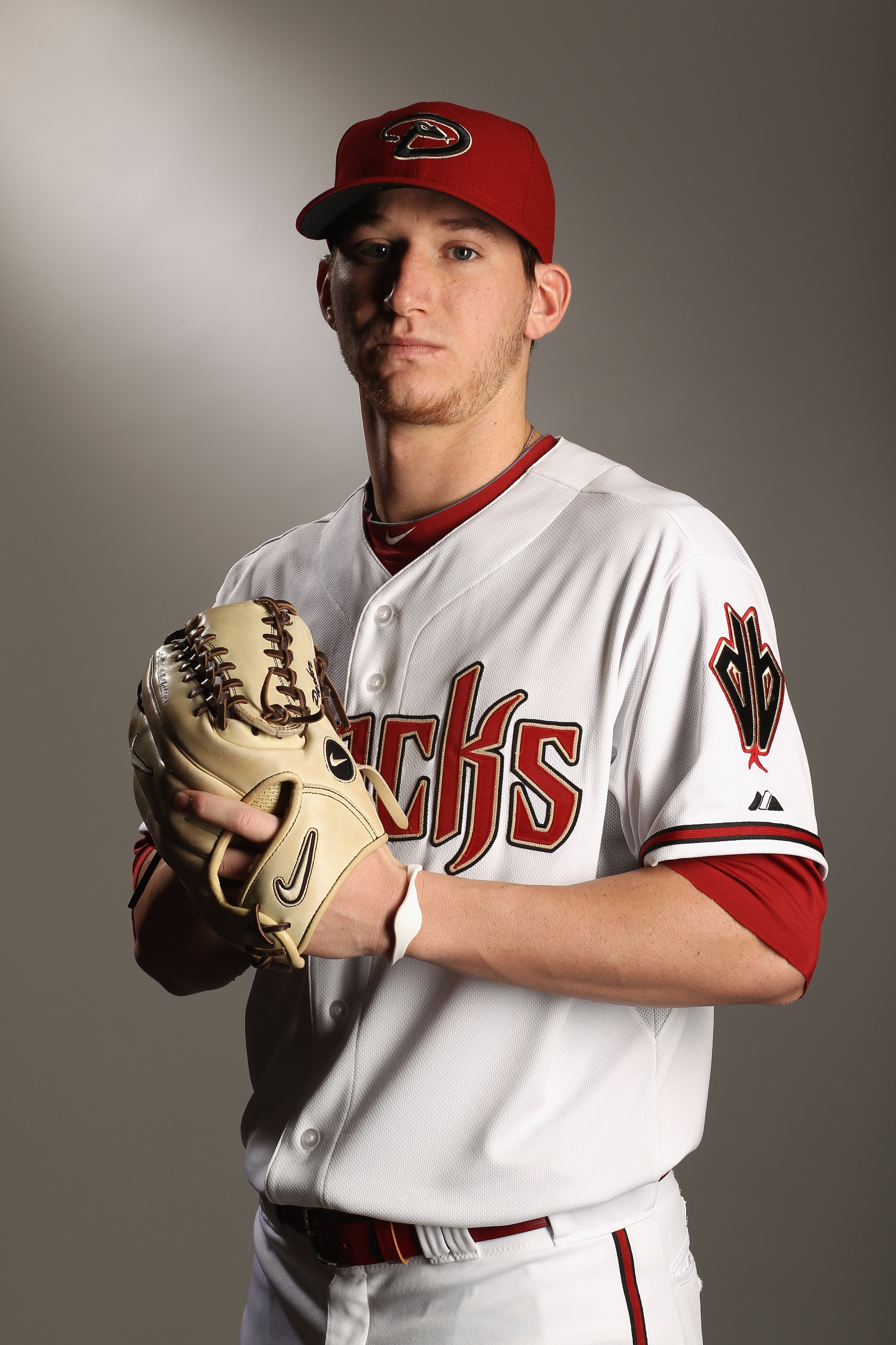 SCOTTSDALE, AZ - FEBRUARY 21: Jarrod Parker #61 of the Arizona Diamondbacks poses for a portrait at Salt River Fields at Talking Stick on February 21, 2011 in Scottsdale, Arizona. (Photo by Ezra Shaw/Getty Images) SCOTTSDALE, AZ - FEBRUARY 21: Jarrod Parker #61 of the Arizona Diamondbacks poses for a portrait at Salt River Fields at Talking Stick on February 21, 2011 in Scottsdale, Arizona. (Photo by Ezra Shaw/Getty Images)