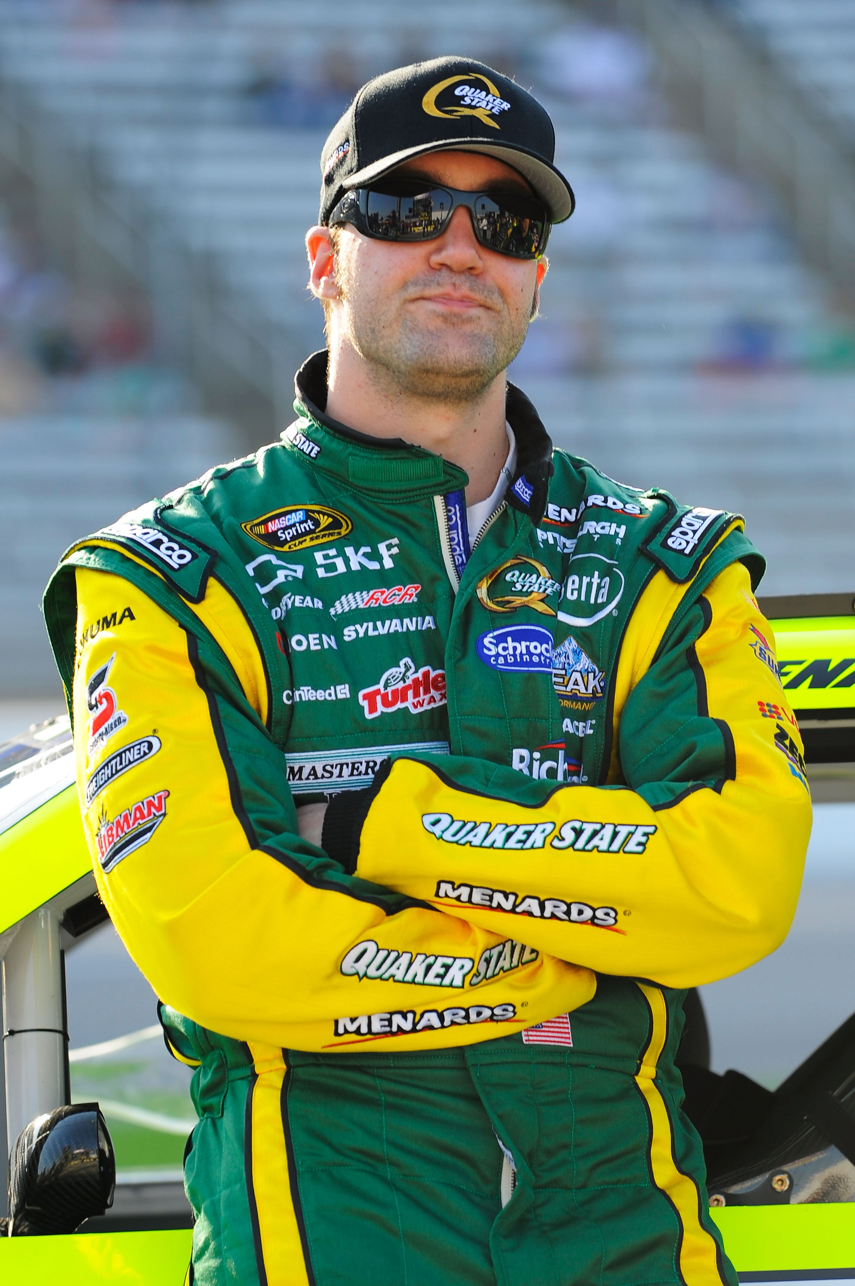 FORT WORTH, TX - APRIL 08:  Paul Menard, driver of the #27 Quaker State/Menards Chevrolet, stands on the grid during qualifying for the NASCAR Sprint Cup Series Samsung Mobile 500 at Texas Motor Speedway on April 8, 2011 in Fort Worth, Texas.  (Photo by J