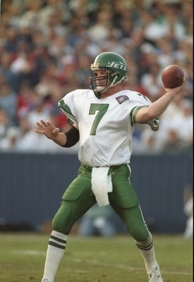 4 Dec 1994:  Quarterback Boomer Esiason of the New York Jets looks to pass the ball during a game against the New England Patriots at Foxboro Stadium in Foxboro, Massachusetts.  The Patriots won the game, 24-13. Mandatory Credit: Rick Stewart  /Allsport