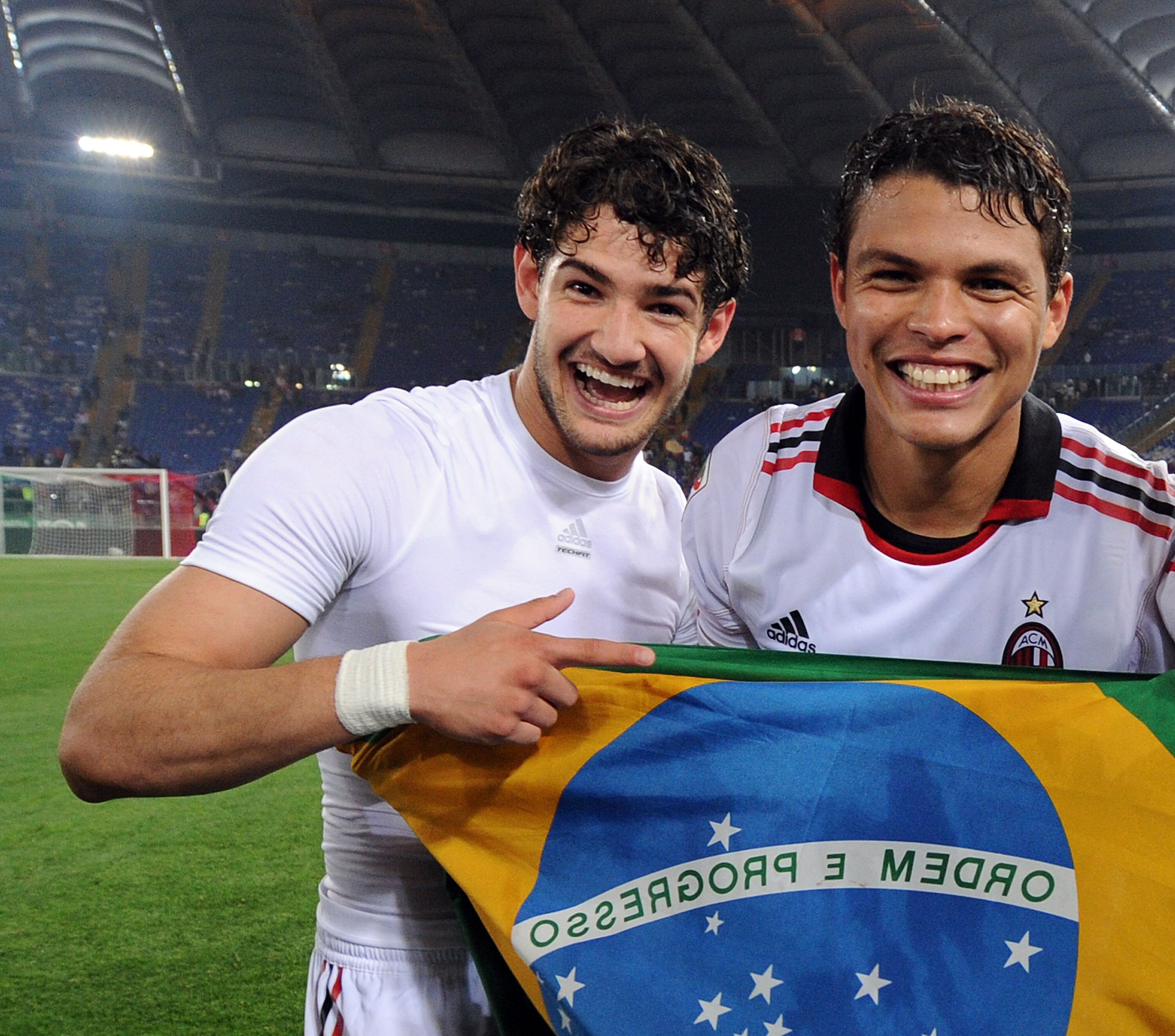 ROME, ITALY - MAY 07:  07:  Thiago Silva and Pato of Milan celebrate the victory after the Serie A match between AS Roma and AC Milan at Stadio Olimpico on May 7, 2011 in Rome, Italy.  (Photo by Giuseppe Bellini/Getty Images)