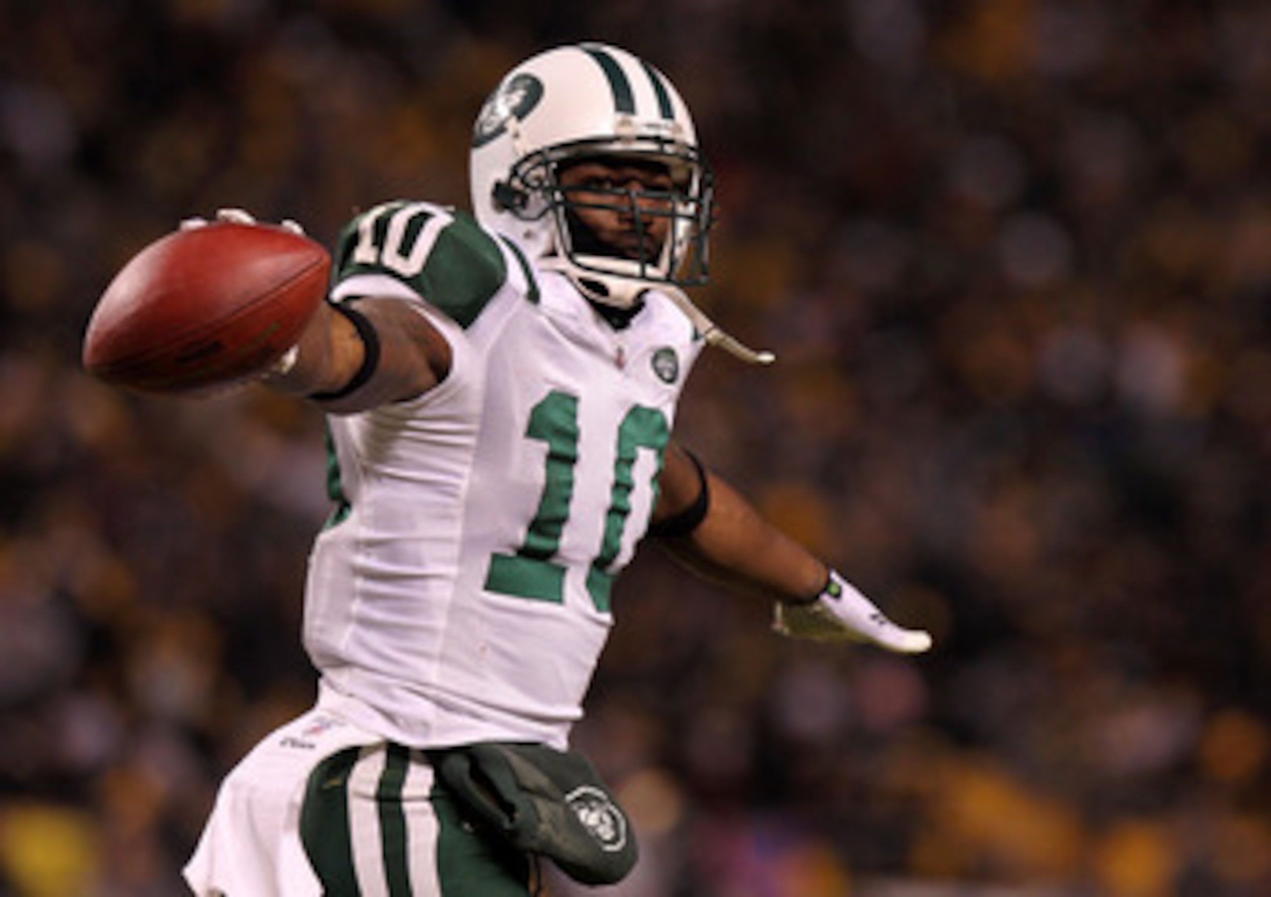 PITTSBURGH, PA - JANUARY 23: Santonio Holmes #10 of the New York Jets celebrates after he scored a third quarter touchdown against the Pittsburgh Steelers during the 2011 AFC Championship game at Heinz Field on January 23, 2011 in Pittsburgh, Pennsylvania