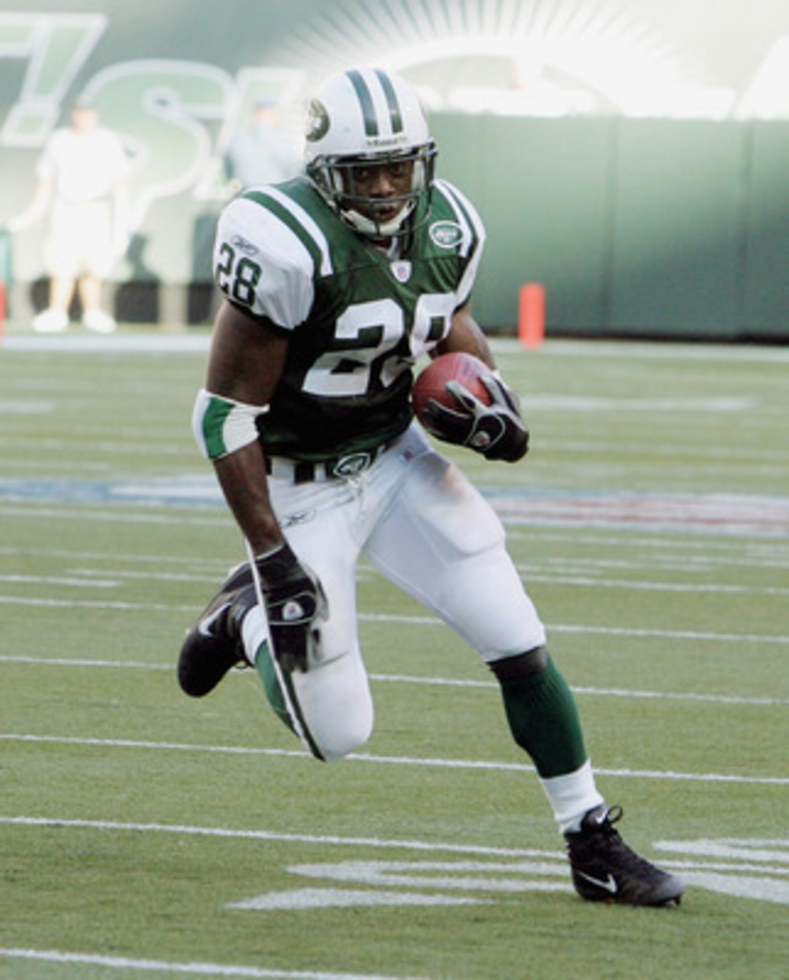 EAST RUTHERFORD, NJ - SEPTEMBER 18: Running back Curtis Martin #28 of the New York Jets runs against the Miami Dolphins during their game on September 18, 2005 at Giants Stadium in East Rutherford, New Jersey. The Jets defeated the Dolphins 17-7. (Photo b