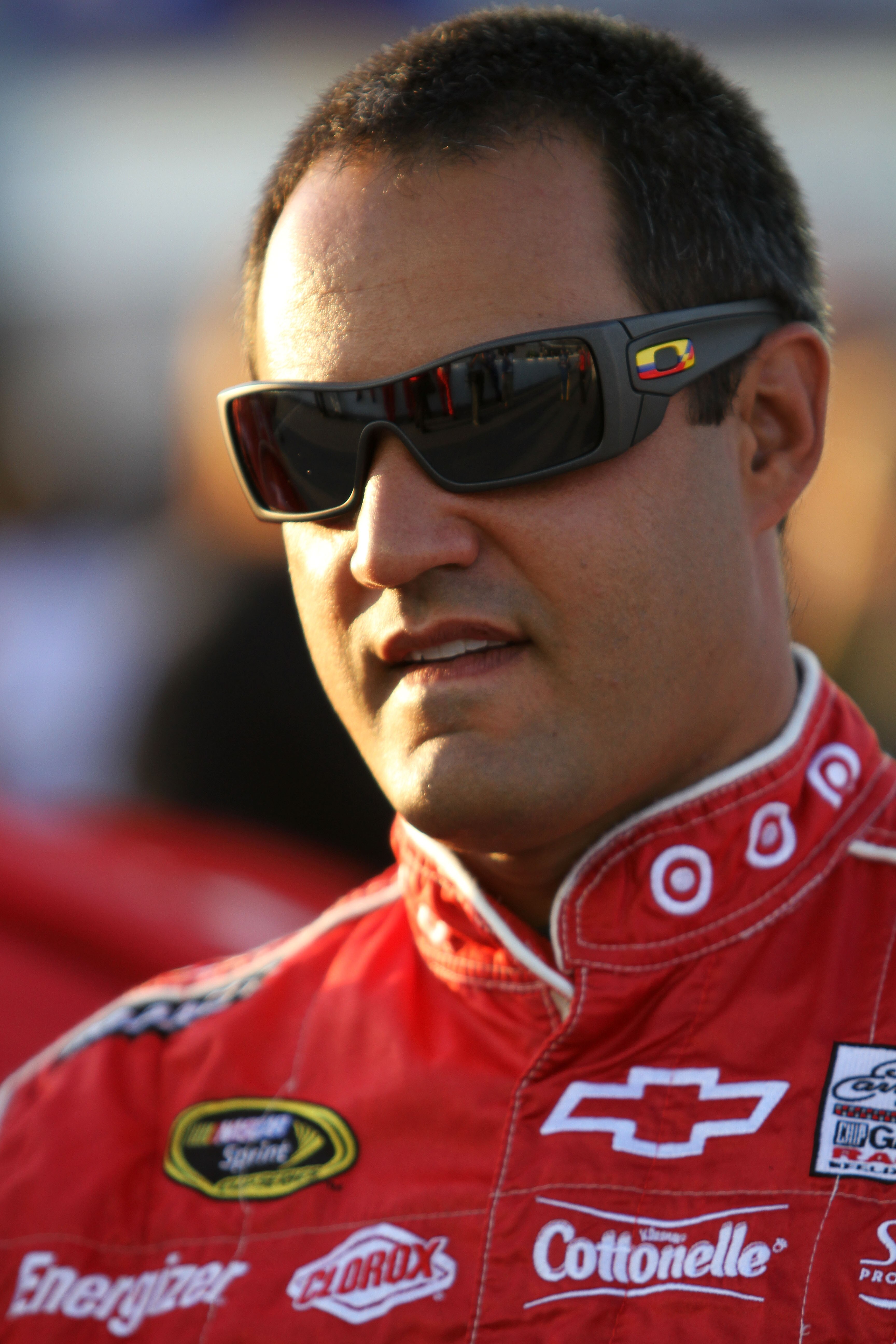 DARLINGTON, SC - MAY 07:  Juan Pablo Montoya, driver of the #42 Target Chevrolet, stands on the grid prior to the NASCAR Sprint Cup Series SHOWTIME Southern 500 at Darlington Raceway on May 7, 2011 in Darlington, South Carolina.  (Photo by Jerry Markland/