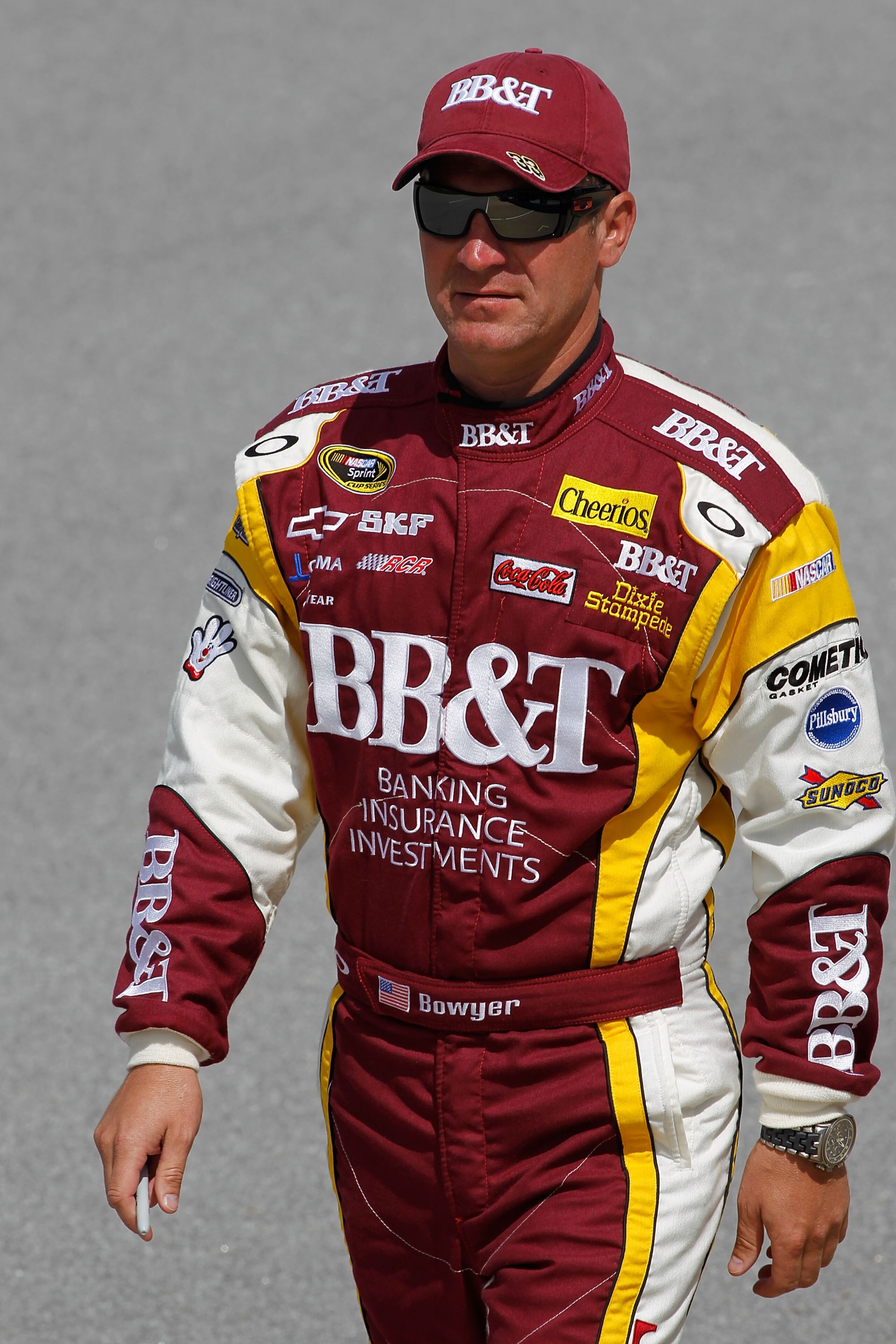 TALLADEGA, AL - APRIL 16:  Clint Bowyer, driver of the #33 BB&T Chevrolet, walks on the grid during qualifying for the NASCAR Sprint Cup Series Aaron's 499 at Talladega Superspeedway on April 16, 2011 in Talladega, Alabama.  (Photo by Todd Warshaw/Getty I
