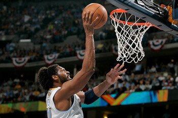 DENVER, CO - APRIL 23:  Nene #31 of the Denver Nuggets scores against the Oklahoma City Thunder in Game Three of the Western Conference Quarterfinals in the 2011 NBA Playoffs at Pepsi Center on April 23, 2011 in Denver, Colorado. NOTE TO USER: User expres