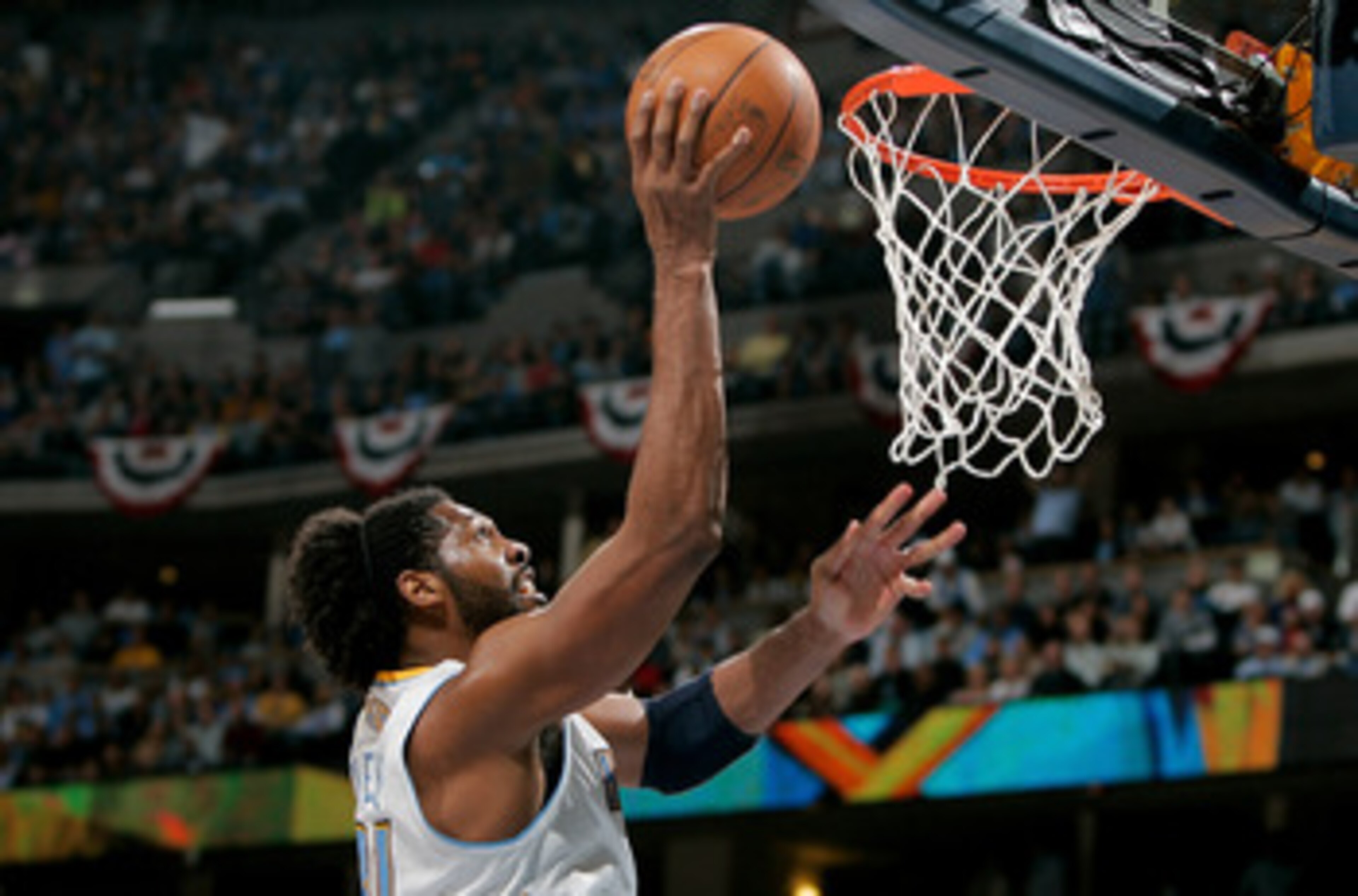 DENVER, CO - APRIL 23: Nene #31 of the Denver Nuggets scores against the Oklahoma City Thunder in Game Three of the Western Conference Quarterfinals in the 2011 NBA Playoffs at Pepsi Center on April 23, 2011 in Denver, Colorado. NOTE TO USER: User expres DENVER, CO - APRIL 23: Nene #31 of the Denver Nuggets scores against the Oklahoma City Thunder in Game Three of the Western Conference Quarterfinals in the 2011 NBA Playoffs at Pepsi Center on April 23, 2011 in Denver, Colorado. NOTE TO USER: User expres