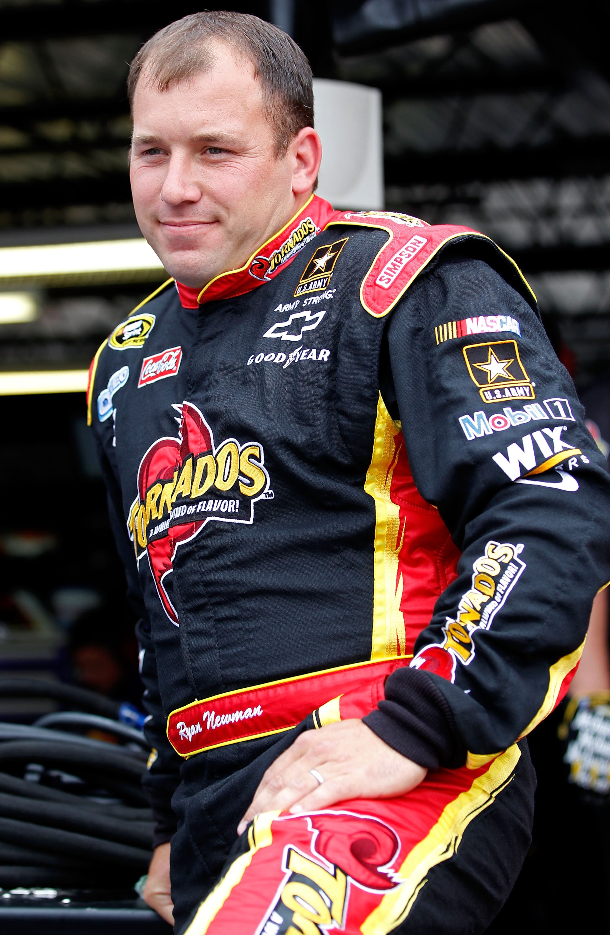 DARLINGTON, SC - MAY 06: Ryan Newman, driver of the #39 Tornados Chevrolet, stands in the garage during practice for the NASCAR Sprint Cup Series SHOWTIME Southern 500 at Darlington Raceway on May 6, 2011 in Darlington, South Carolina.  (Photo by Geoff Bu