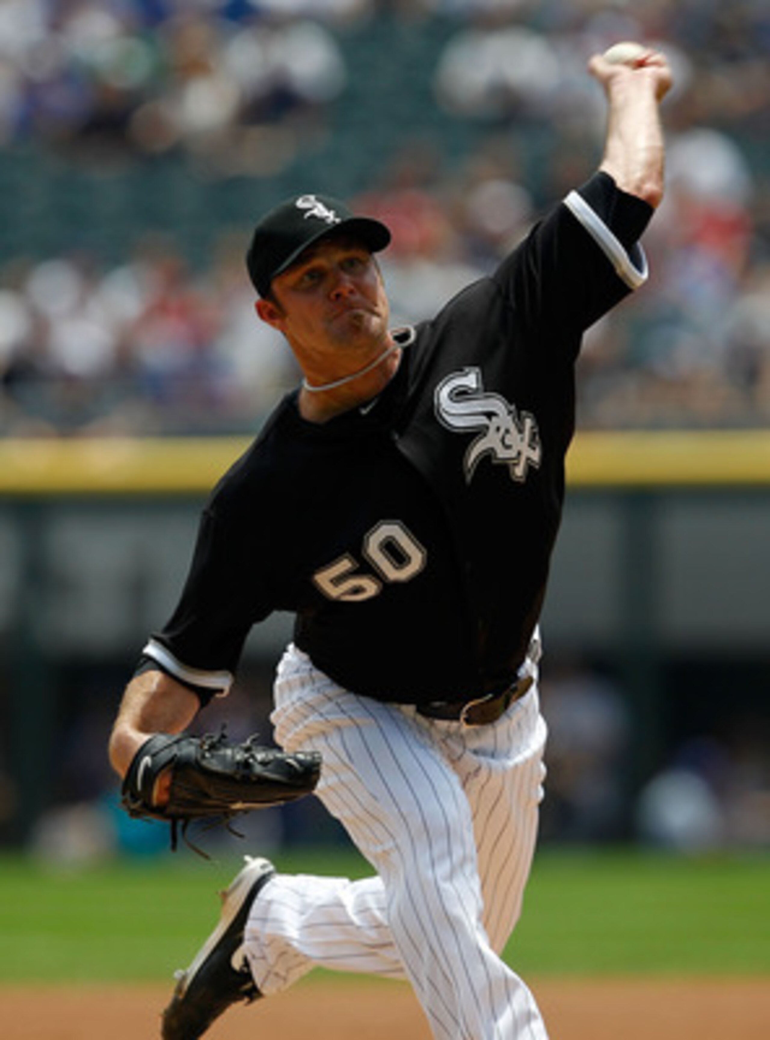 CHICAGO - JUNE 27: Starting pitcher John Danks #50 of the Chicago White Sox delivers the ball against the Chicago Cubs at U.S. Cellular Field on June 27, 2010 in Chicago, Illinois. (Photo by Jonathan Daniel/Getty Images) CHICAGO - JUNE 27: Starting pitcher John Danks #50 of the Chicago White Sox delivers the ball against the Chicago Cubs at U.S. Cellular Field on June 27, 2010 in Chicago, Illinois. (Photo by Jonathan Daniel/Getty Images)