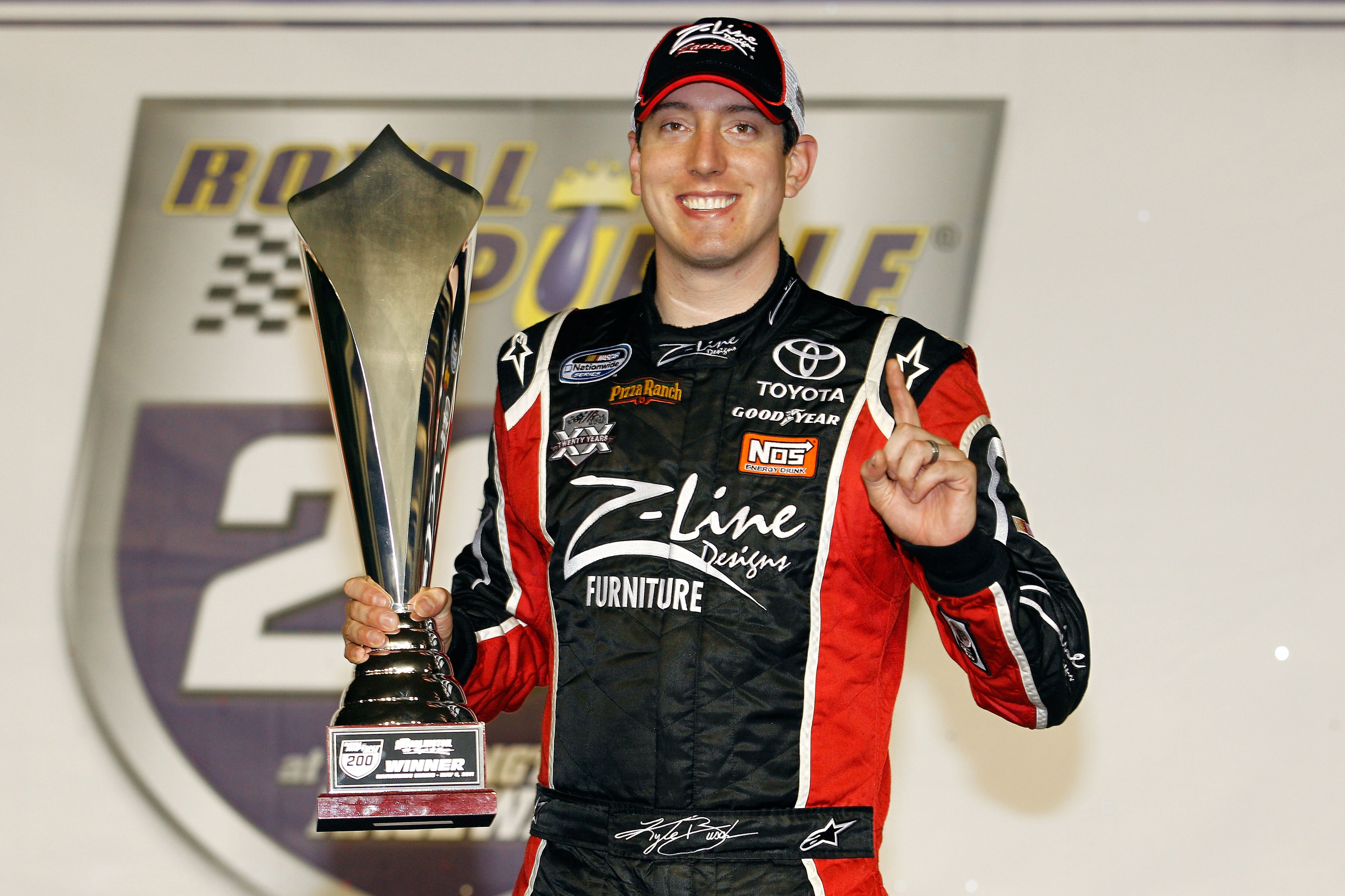DARLINGTON, SC - MAY 06:  Kyle Busch, driver of the #18 Z-Line Designs Toyota, celebrates in Victory Lane after winning the NASCAR Nationwide Series Royal Purple 200 at Darlington Raceway on May 6, 2011 in Darlington, South Carolina.  (Photo by Chris Gray