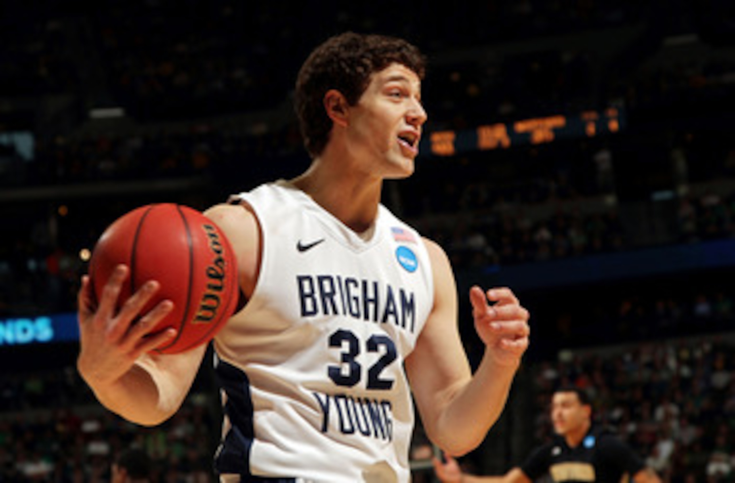 DENVER, CO - MARCH 17:  Jimmer Fredette #32 of the Brigham Young Cougars reacts to a call while playing against the Wofford Terriers during the second round of the 2011 NCAA men's basketball tournament at Pepsi Center on March 17, 2011 in Denver, Colorado
