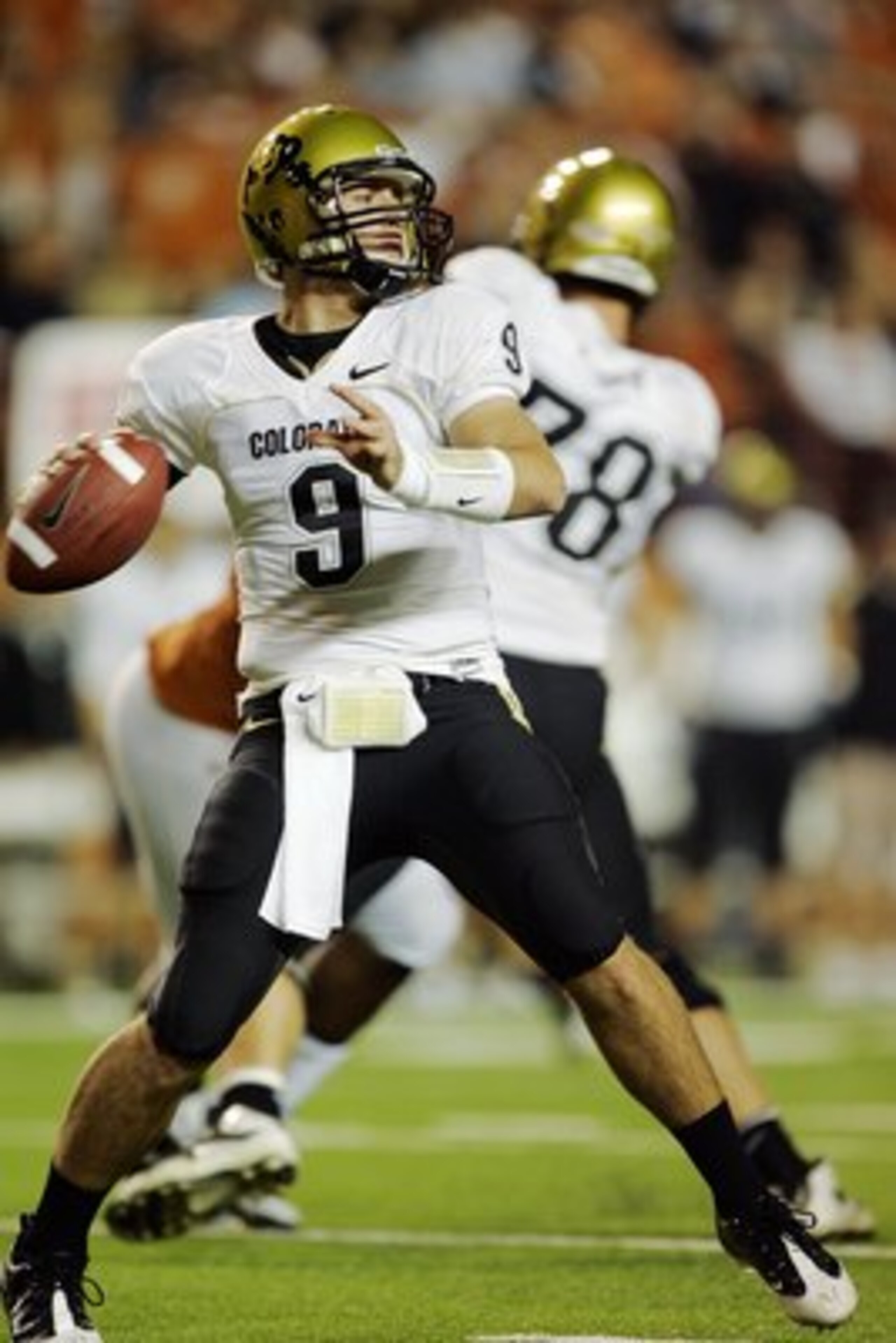 AUSTIN, TX - OCTOBER 10:  Quarterback Tyler Hansen #9 of the Colorado Buffaloes looks for a receiver against the Texas Longhorns on October 10, 2009 at Darrell K Royal-Texas Memorial Stadium in Austin, Texas.  Texas won 38-14.  (Photo by Brian Bahr/Getty