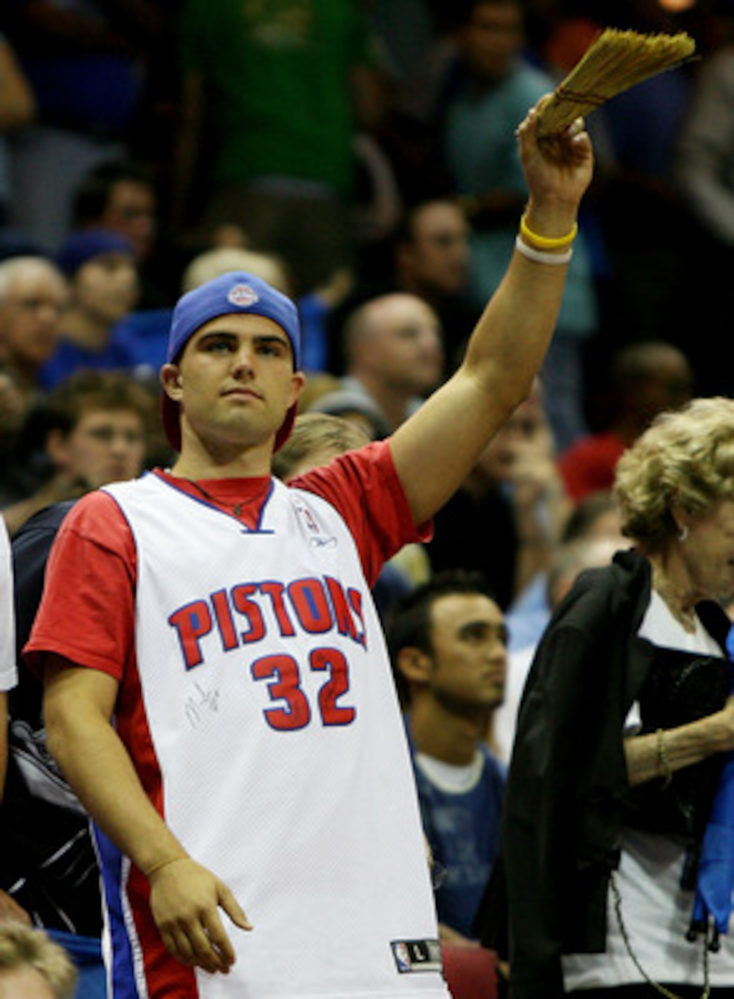 ORLANDO, FL - APRIL 28:  A Pistons' fan waves a broom as the Orlando Magic fail to win a game against the Detroit Pistons in Game Four of the Eastern Conference Quarterfinals during the 2007 NBA Playoffs at Amway Arena on April 28, 2007 in Orlando, Florid