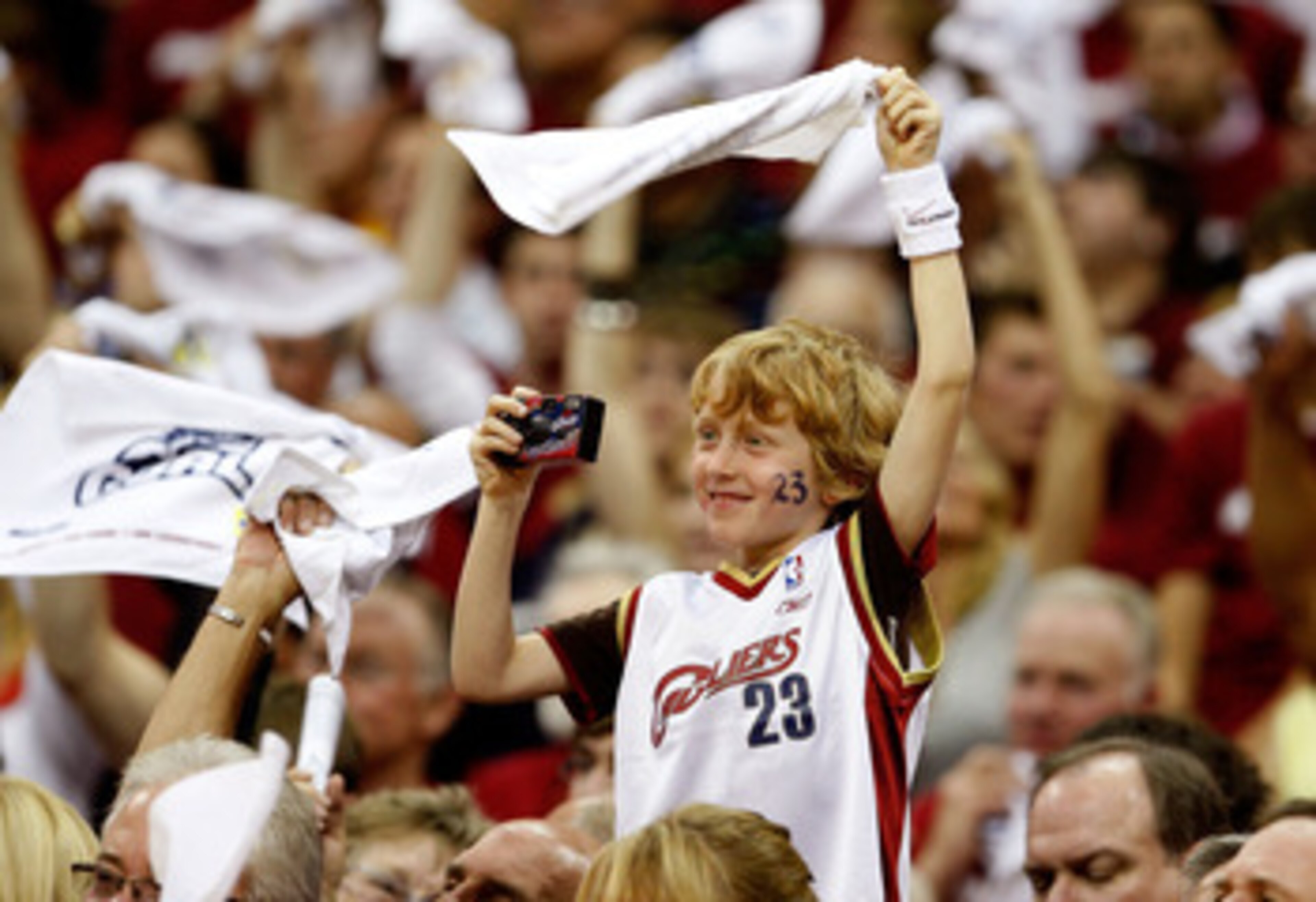 CLEVELAND - MAY 20: Fans of the Cleveland Cavaliers react in the stands during Game One of the Eastern Conference Finals against the Orlando Magic during the 2009 Playoffs at Quicken Loans Arena on May 20, 2009 in Cleveland, Ohio. NOTE TO USER: User expre