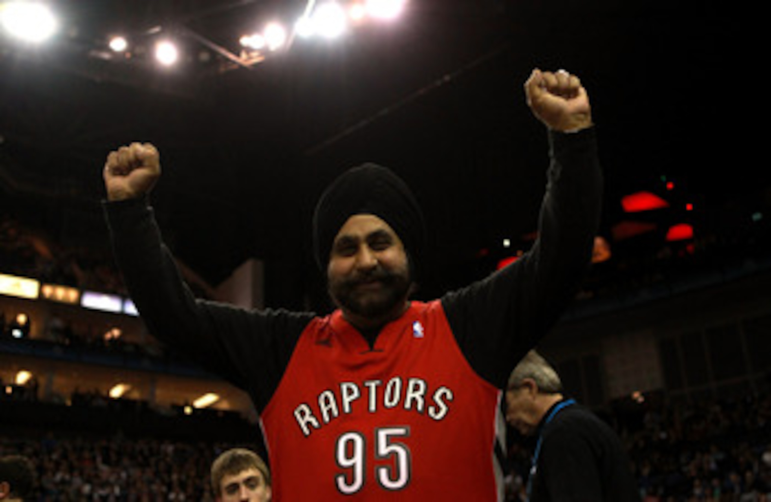 LONDON, ENGLAND - MARCH 04:  A Raptors fans cheers on his team during the NBA match between New Jersey Nets and the Toronto Raptors at the O2 Arena on March 4, 2011 in London, England. NOTE TO USER: User expressly acknowledges and agrees that, by download