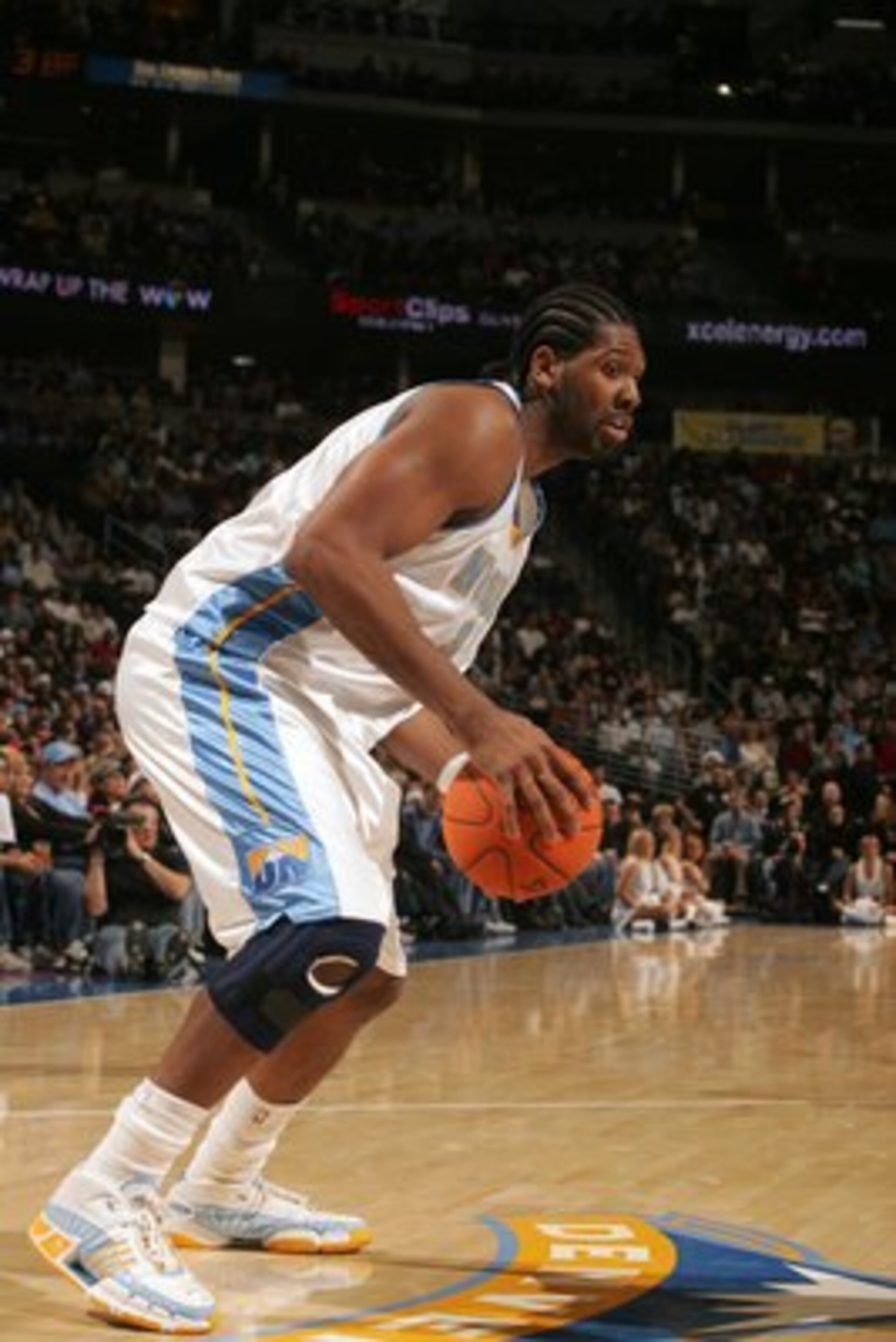 DENVER - DECEMBER 22:  Nene #31 of the Denver Nuggets controls the ball against the Sacramento Kings at the Pepsi Center on December 22, 2006 in Denver, Colorado. The Kings won 101-96. NOTE TO USER: User expressly acknowledges and agrees that, by download