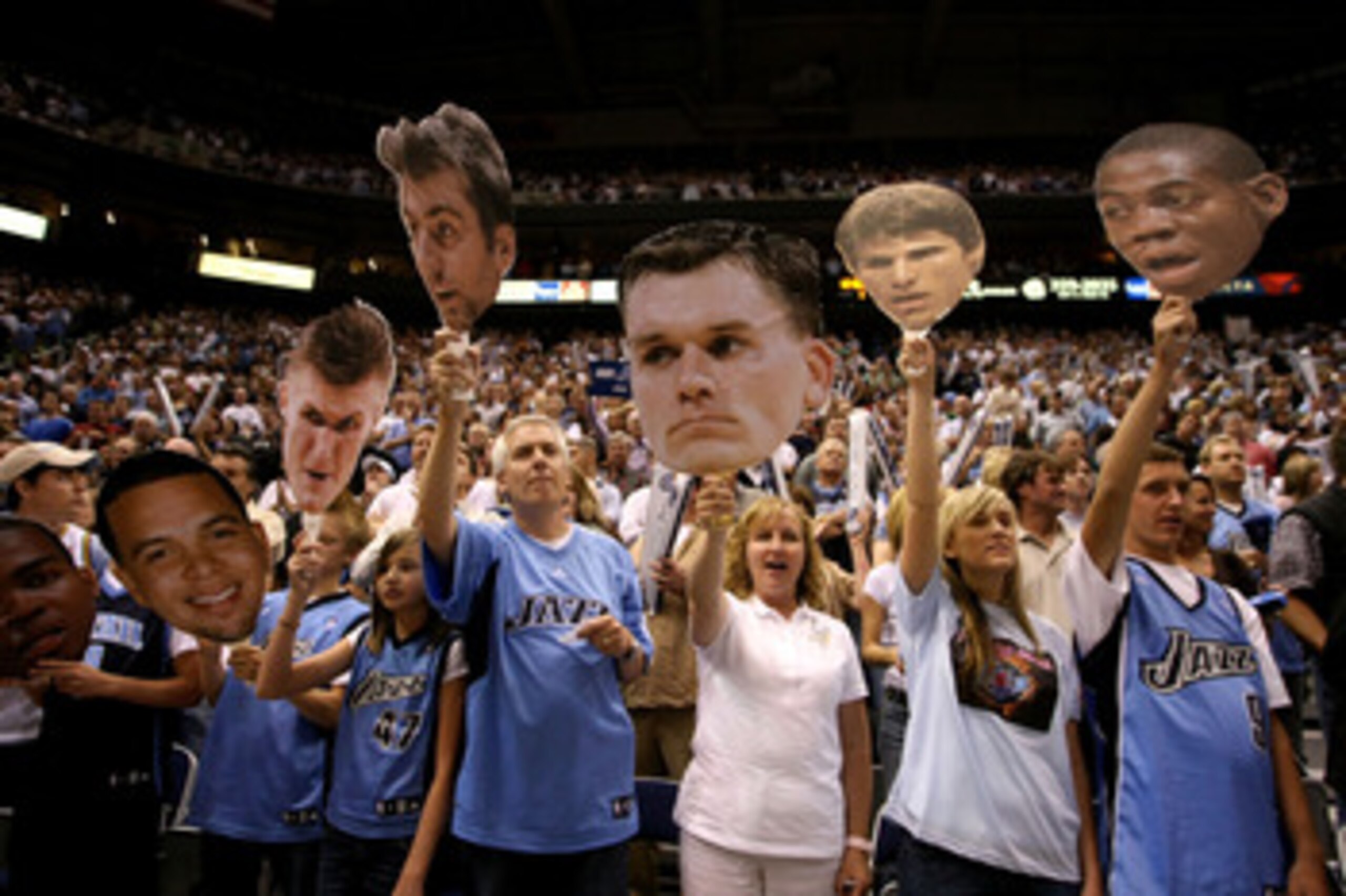 SALT LAKE CITY - APRIL 26:  Utah Jazz fans hold up headshots of their favorite players during Game Four of the Western Conference Quarterfinals against the Houston Rockets during the 2008 NBA Playoffs at Energy Solutions Arena on April 26, 2008 in Salt La