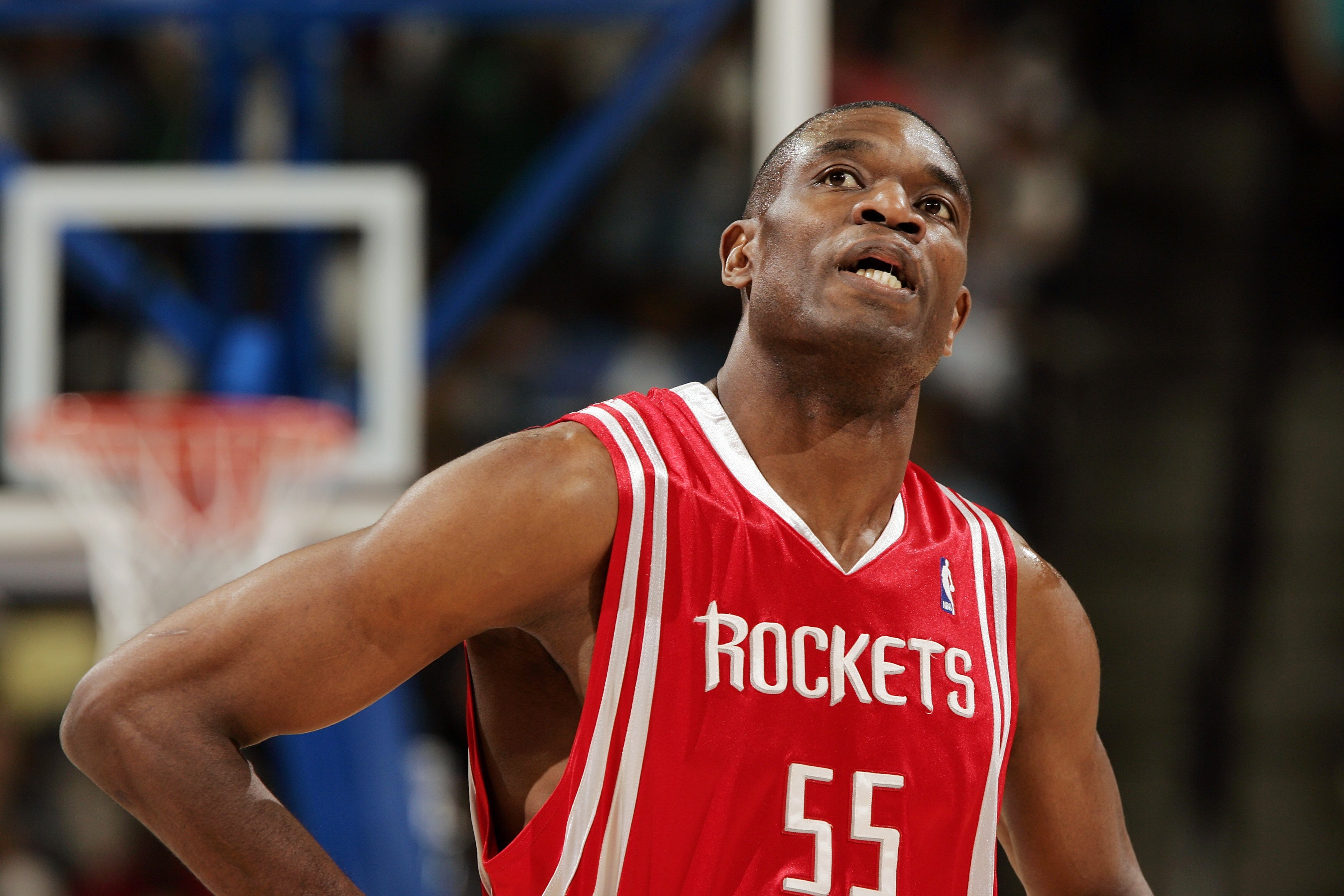 DENVER - APRIL 17:  Dikembe Mutombo #55 of Houston Rockets looks up at the clock in the fourth quarter against the Denver Nuggets on April 17, 2006 at the Pepsi Center in Denver, Colorado. The Rockets won 86-83.  NOTE TO USER: USER expressly acknowledges