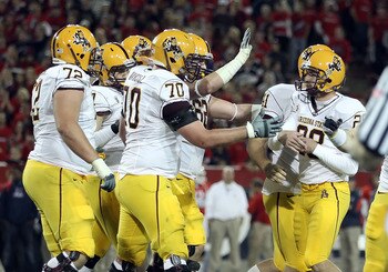 TUCSON, AZ - DECEMBER 02: Kicker Thomas Weber #26 of the Arizona State Sun Devils is congratulated by teammates after kicking a 36 yard field goal against the Arizona Wildcats during the second quarter of the college football game at Arizona Stadium on D TUCSON, AZ - DECEMBER 02: Kicker Thomas Weber #26 of the Arizona State Sun Devils is congratulated by teammates after kicking a 36 yard field goal against the Arizona Wildcats during the second quarter of the college football game at Arizona Stadium on D