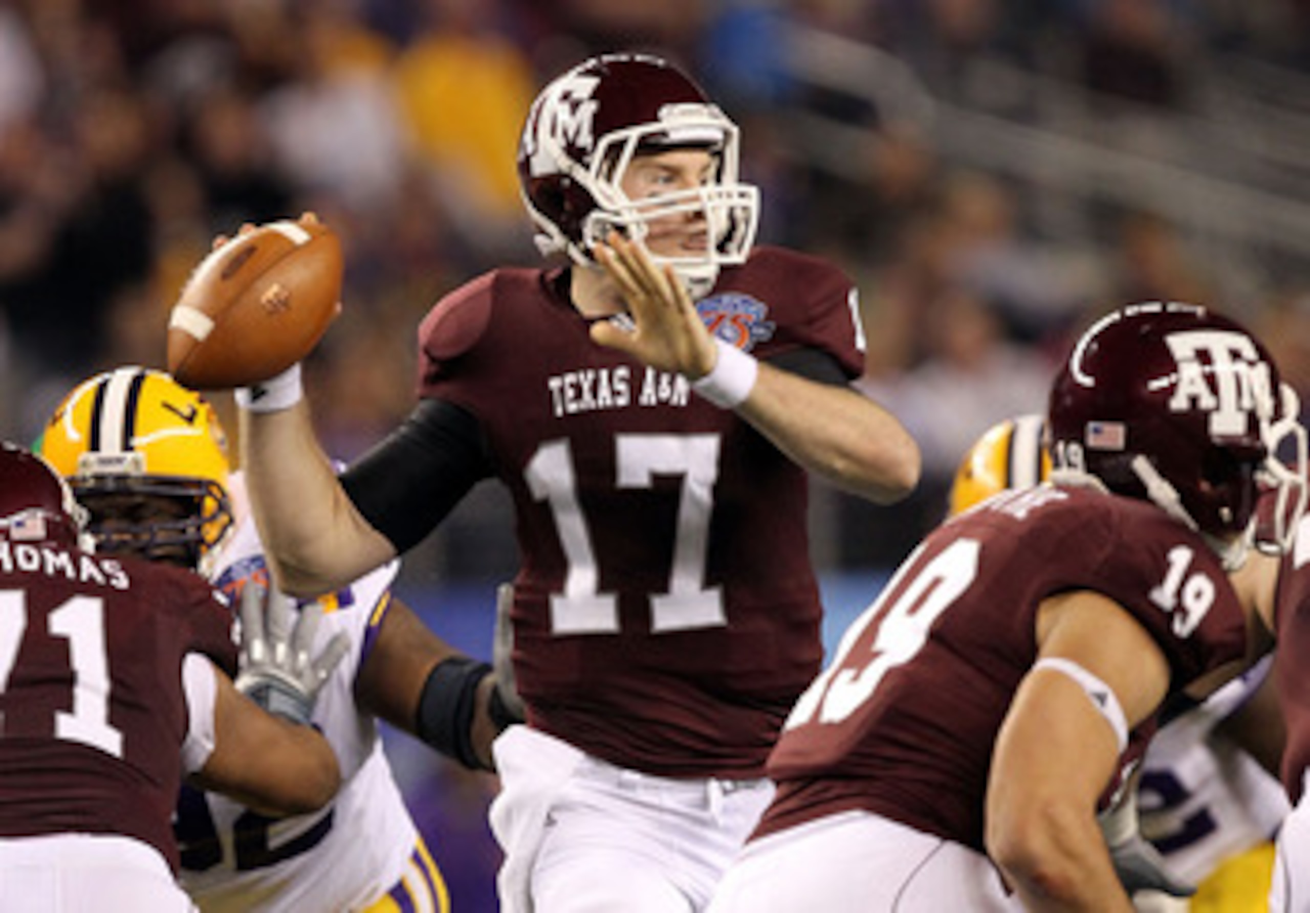ARLINGTON, TX - JANUARY 07:  Quarterback Ryan Tannehill #17 of the Texas A&M Aggies throws against the LSU Tigers during the AT&T Cotton Bowl at Cowboys Stadium on January 7, 2011 in Arlington, Texas.  (Photo by Ronald Martinez/Getty Images)