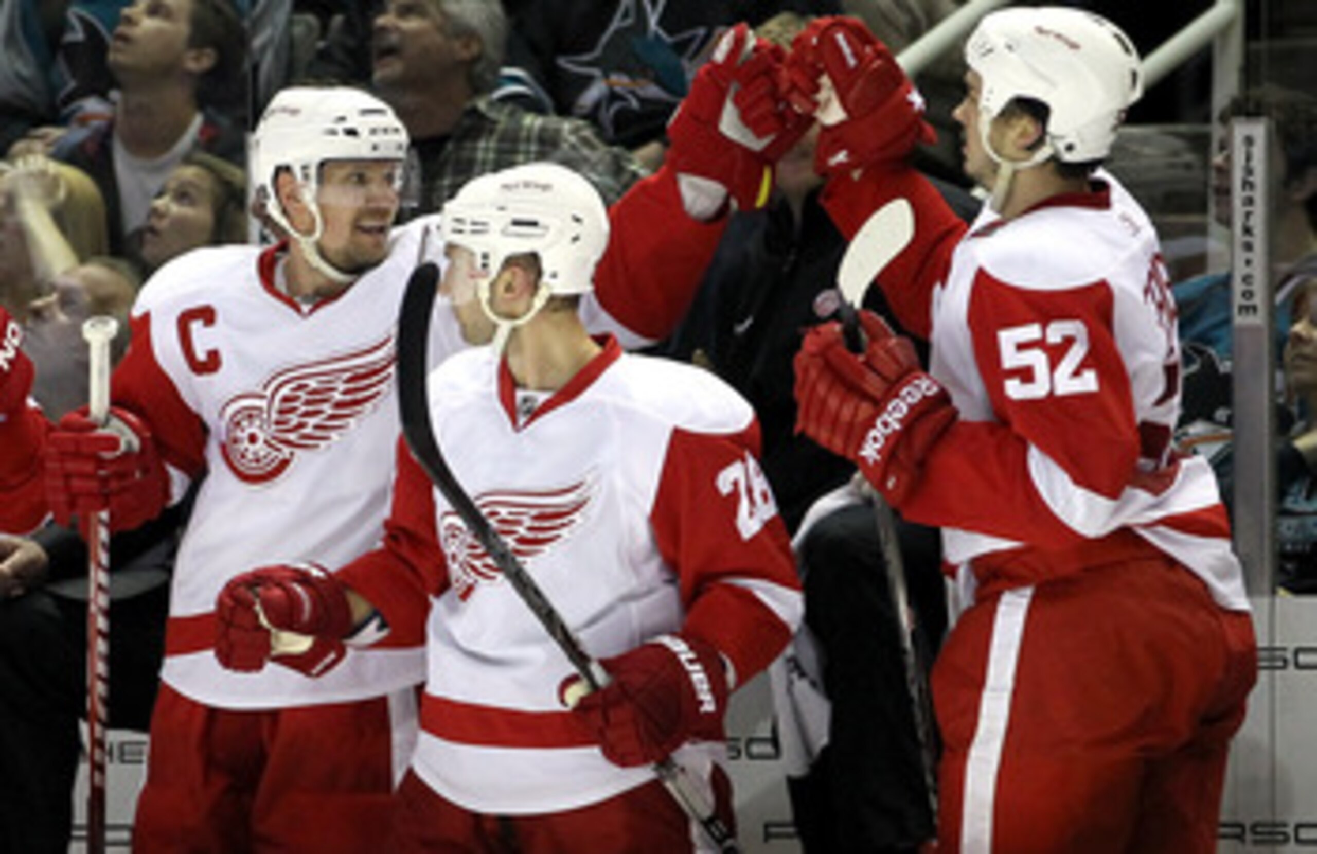SAN JOSE, CA - MAY 08:  Nicklas Lidstrom #5 and Jonathan Ericsson #52 of the Detroit Red Wings celebrate after the Red Wings scored a goal against the San Jose Sharks in Game Five of the Western Conference Semifinals during the 2011 NHL Stanley Cup Playof