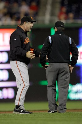 WASHINGTON, DC - APRIL 29: Manager Bruce Bochy #15 of the San Francisco Giants argues a call with second base umpire Rob Drake during the fifth inning against the Washington Nationals at Nationals Park on April 29, 2011 in Washington, DC.  (Photo by Rob C