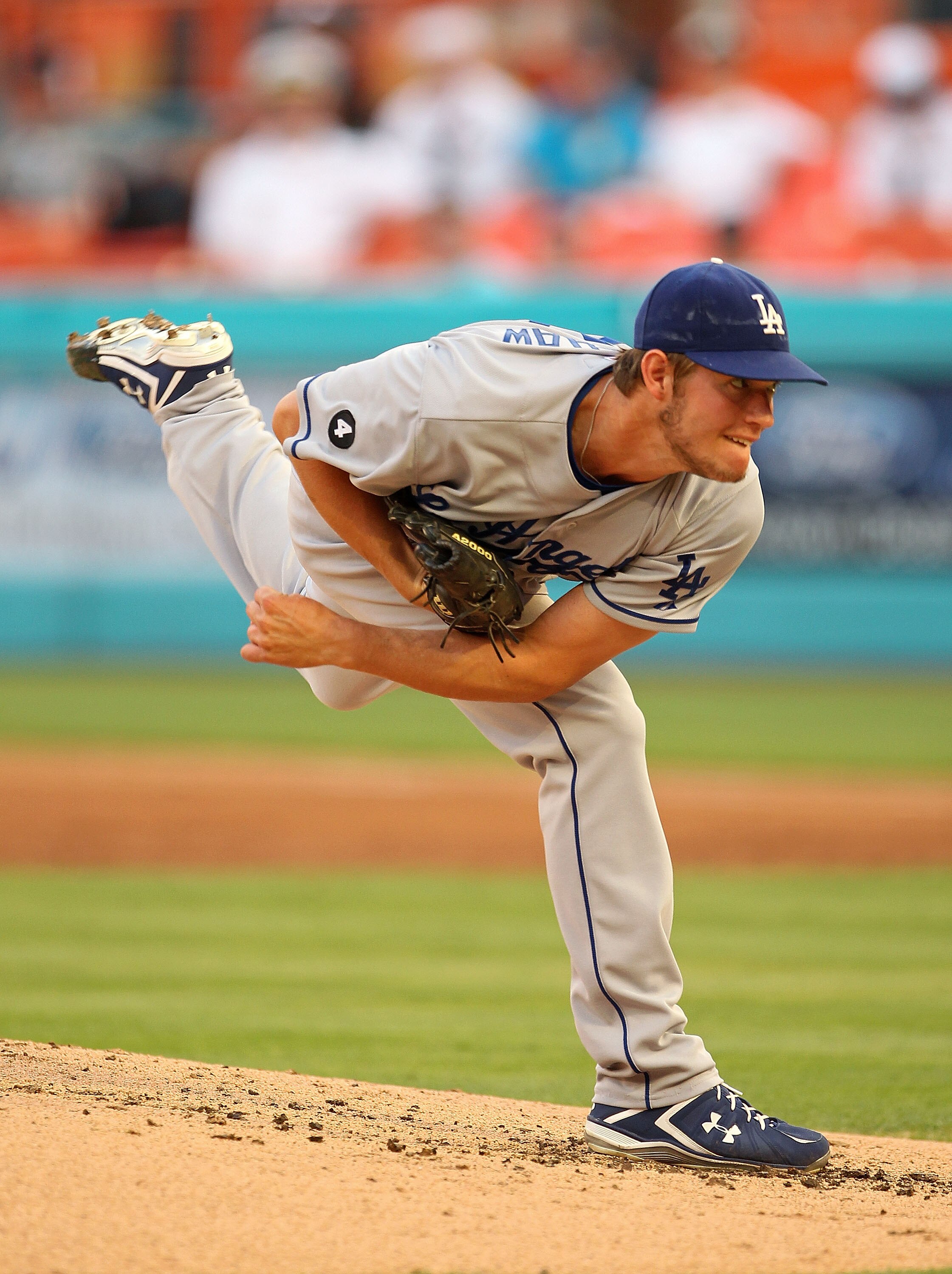 MIAMI GARDENS, FL - APRIL 26:  Clayton Kershaw #22 of the Los Angeles Dodgers pitches during a game against the Florida Marlins at Sun Life Stadium on April 26, 2011 in Miami Gardens, Florida.  (Photo by Mike Ehrmann/Getty Images)