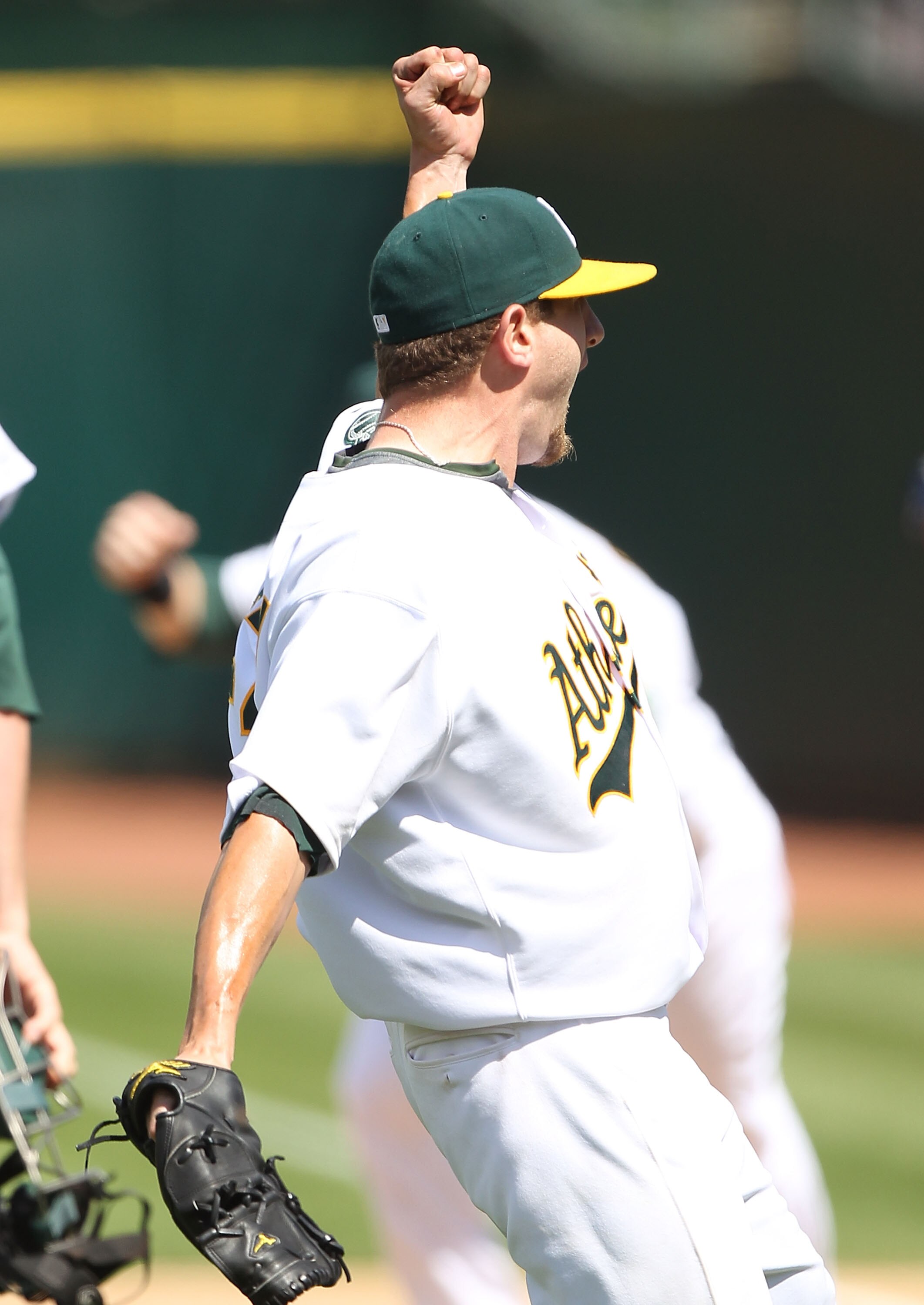 OAKLAND, CA - MAY 09:  Dallas Braden #51 of the Oakland Athletics celebrates after pitching a perfect game against the Tampa Bay Rays during an MLB game at the Oakland-Alameda County Coliseum on May 9, 2010 in Oakland, California.  (Photo by Jed Jacobsohn