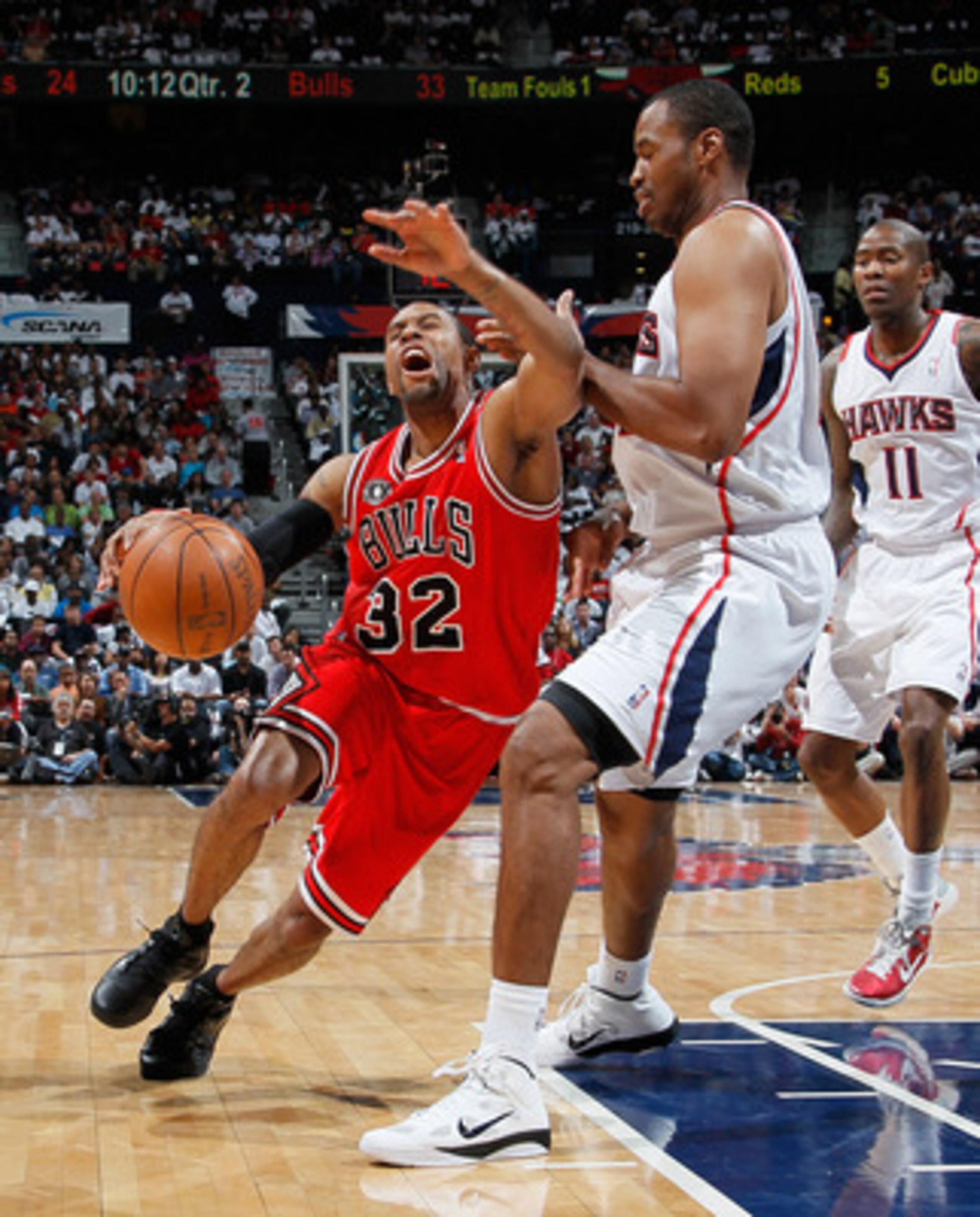 ATLANTA, GA - MAY 06: C.J. Watson #32 of the Chicago Bulls draws a foul from Jason Collins #34 of the Atlanta Hawks in Game Three of the Eastern Conference Semifinals in the 2011 NBA Playoffs at Phillips Arena on May 6, 2011 in Atlanta, Georgia. NOTE TO ATLANTA, GA - MAY 06: C.J. Watson #32 of the Chicago Bulls draws a foul from Jason Collins #34 of the Atlanta Hawks in Game Three of the Eastern Conference Semifinals in the 2011 NBA Playoffs at Phillips Arena on May 6, 2011 in Atlanta, Georgia. NOTE TO