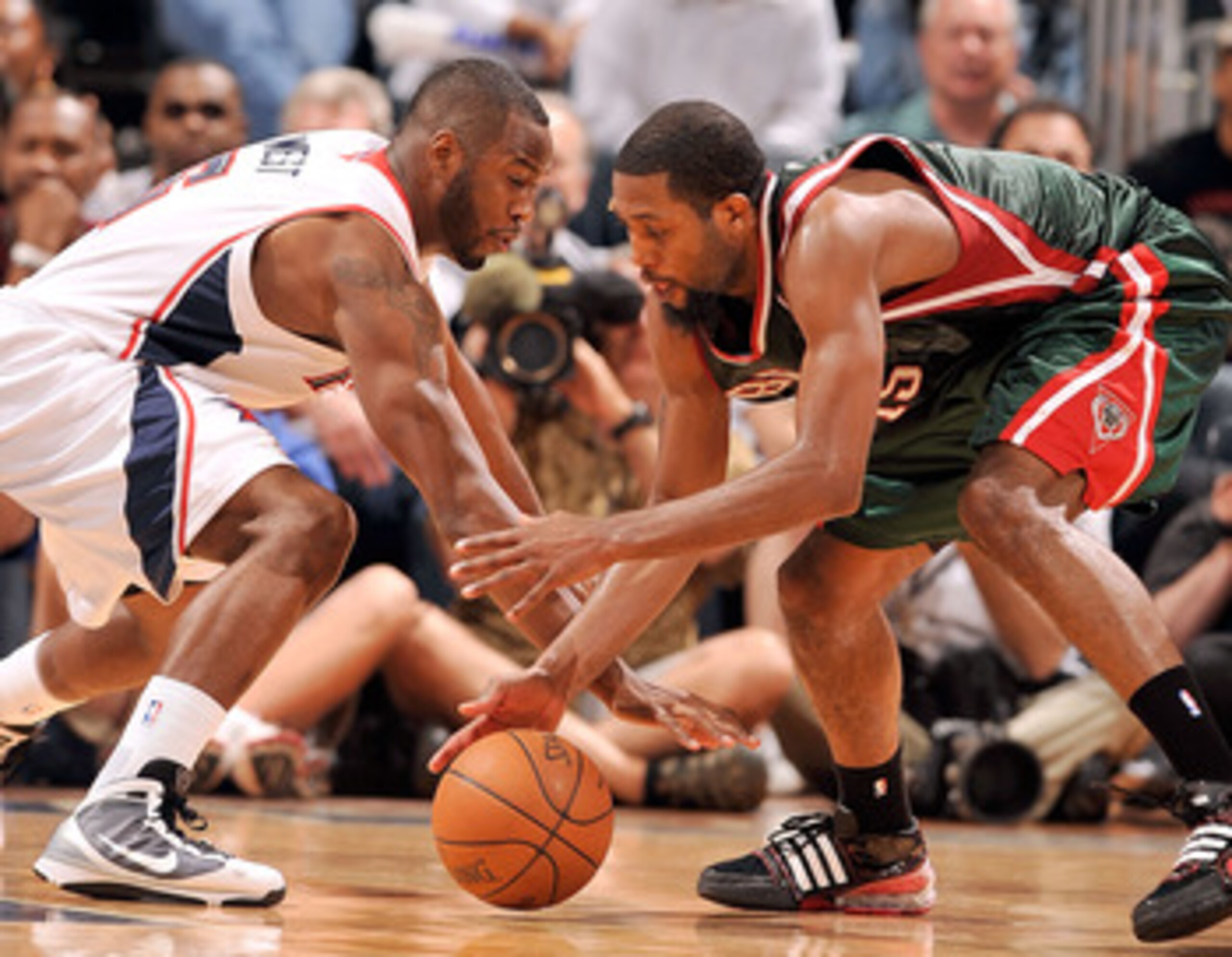 ATLANTA - APRIL 17: Mario West #6 of the Atlanta Hawks forces a turnover by John Salmons #15 of the Milwaukee Bucks during Game One of the Eastern Conference Quarterfinals of the 2010 NBA Playoffs at Philips Arena on April 17, 2010 in Atlanta, Georgia. N ATLANTA - APRIL 17: Mario West #6 of the Atlanta Hawks forces a turnover by John Salmons #15 of the Milwaukee Bucks during Game One of the Eastern Conference Quarterfinals of the 2010 NBA Playoffs at Philips Arena on April 17, 2010 in Atlanta, Georgia. N