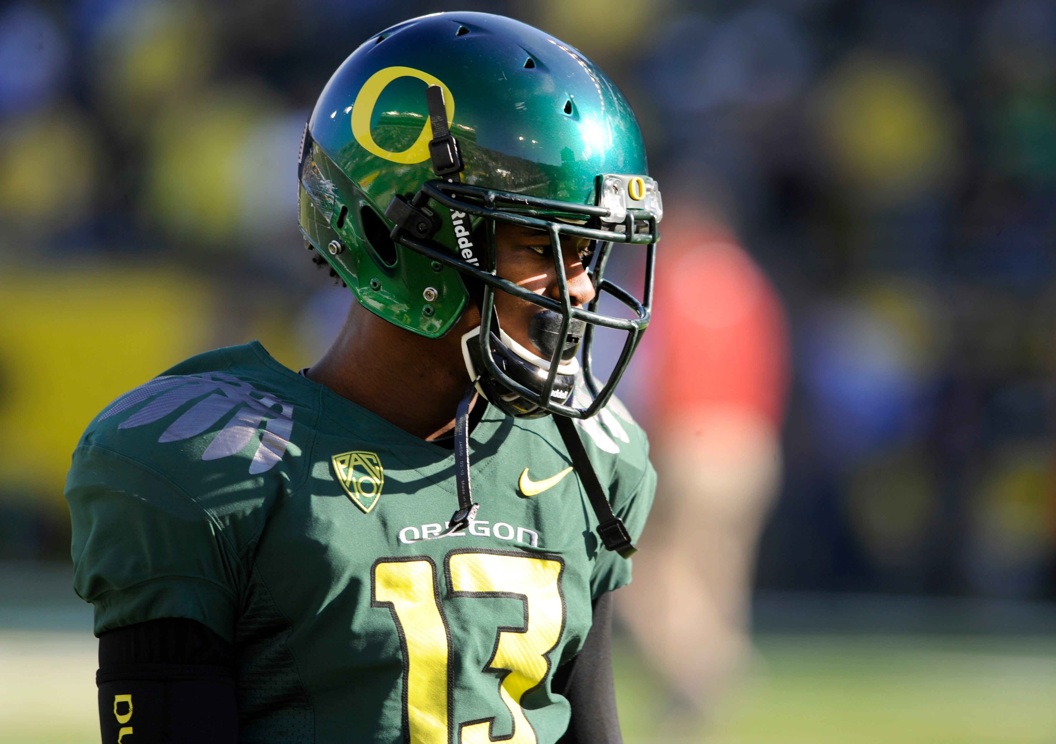 EUGENE, OR - OCTOBER 2: Cornerback Cliff Harris #13 of the Oregon Ducks warms before the start of the game at Autzen Stadium on October 2, 2010 in Eugene, Oregon. Oregon won the game 52-31. (Photo by Steve Dykes/Getty Images)