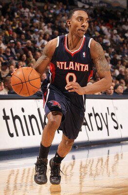 DENVER, CO - FEBRUARY 28:  Jeff Teague #0 of the Atlanta Hawks controls the ball against the Denver Nuggets during NBA action at the Pepsi Center on February 28, 2011 in Denver, Colorado. The Nuggets deafeated the Hawks 100-90. NOTE TO USER: User expressl