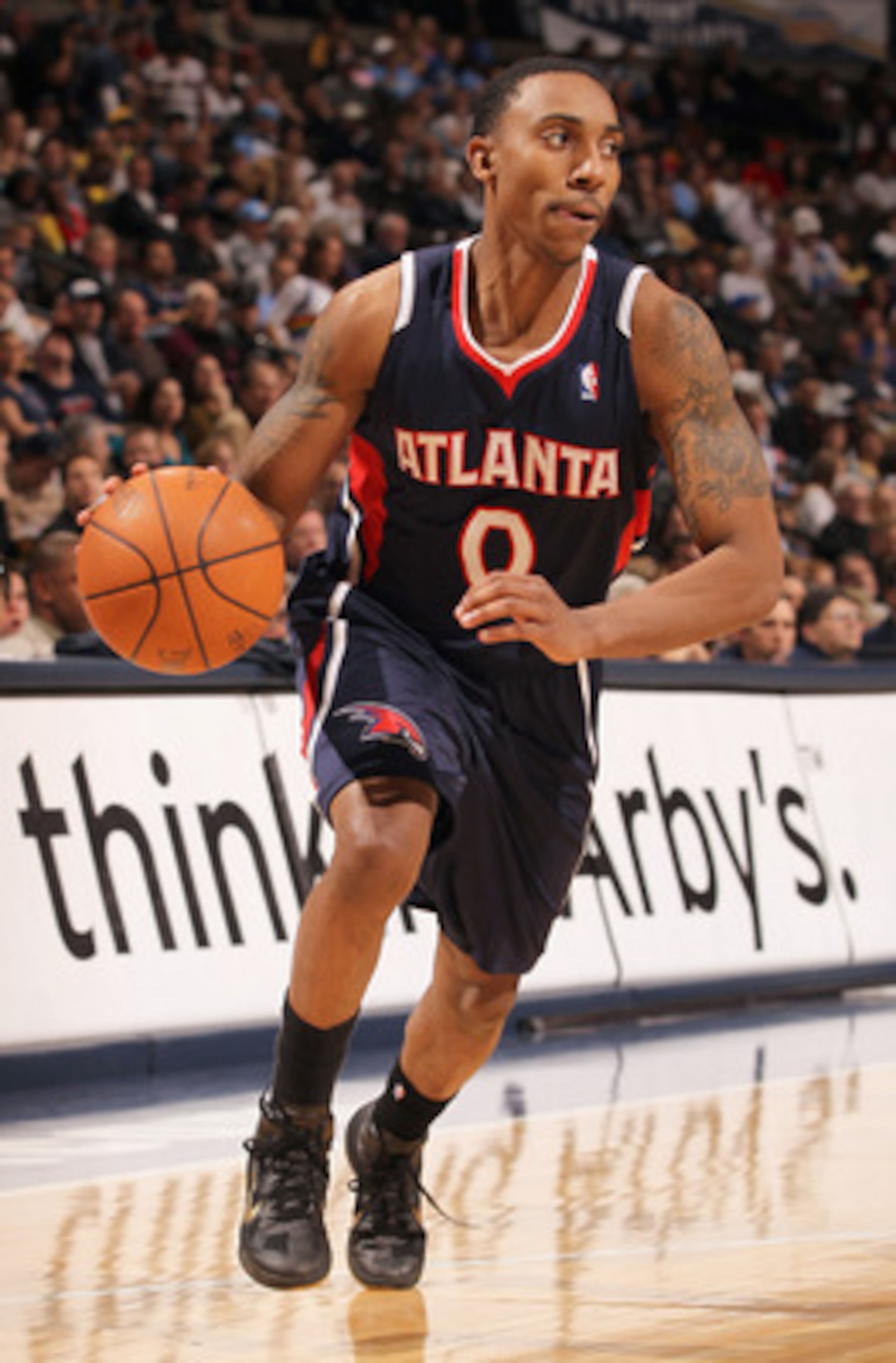 DENVER, CO - FEBRUARY 28:  Jeff Teague #0 of the Atlanta Hawks controls the ball against the Denver Nuggets during NBA action at the Pepsi Center on February 28, 2011 in Denver, Colorado. The Nuggets deafeated the Hawks 100-90. NOTE TO USER: User expressl