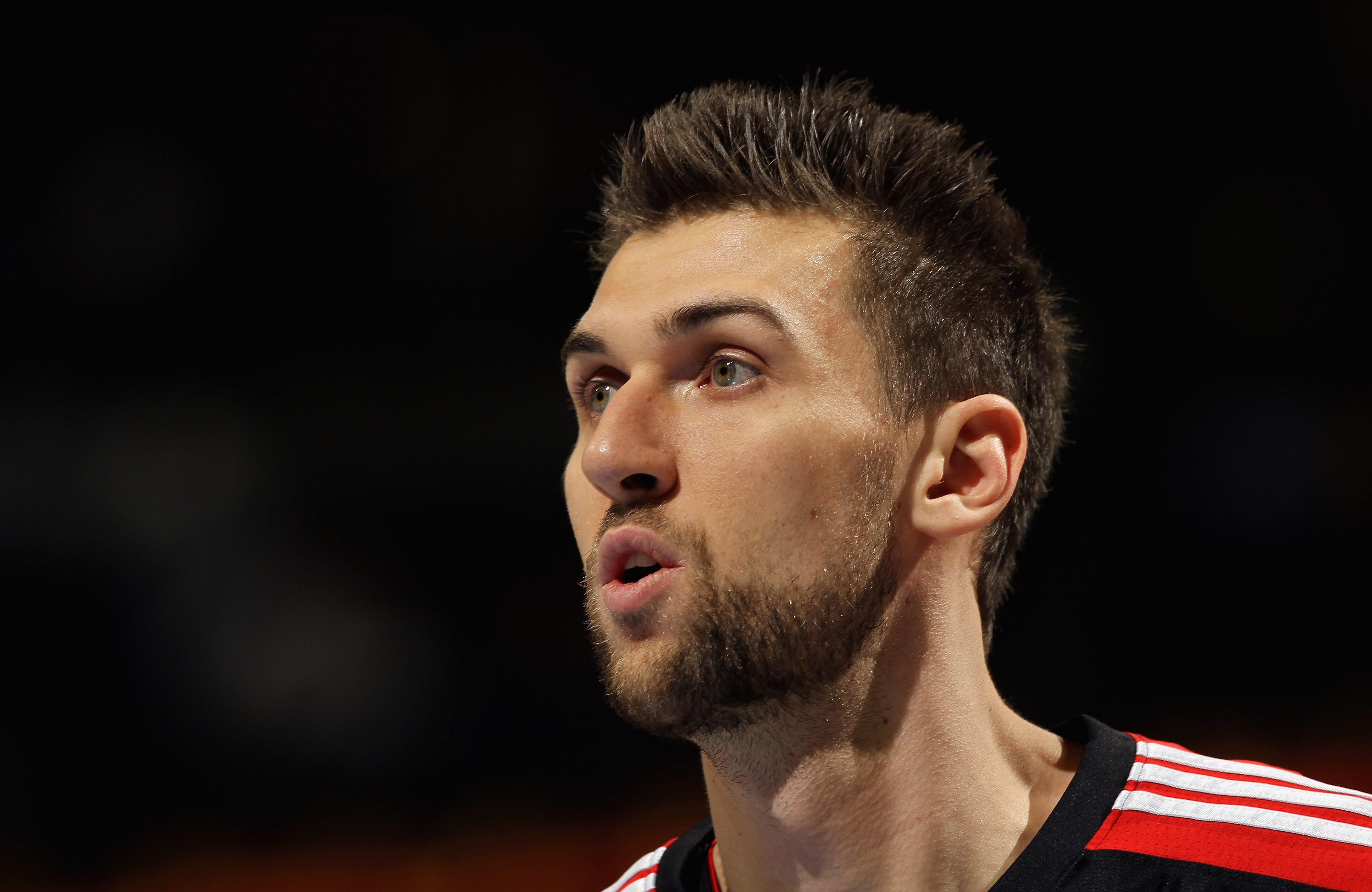 DENVER, CO - MARCH 21:  Andrea Bargnani #7 of the Toronto Raptors looks on during a break in the action against the Denver Nuggets at the Pepsi Center on March 21, 2011 in Denver, Colorado. The Nuggets defeated the Raptors 123-90. NOTE TO USER: User expre