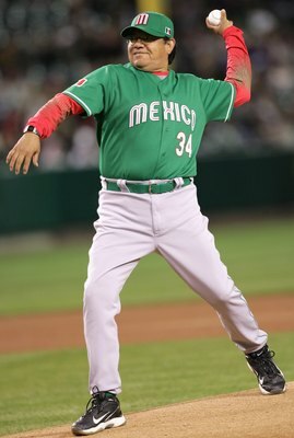 ANAHEIM, CA - MARCH 12:  Fernando Valenzuela #34 of Team Mexico throws out the first pitch before the Round 2 Pool 2 Game of the World Baseball Classic against Team Korea at Angel Stadium on March 12, 2006 in Anaheim, California.  (Photo by Stephen Dunn/G