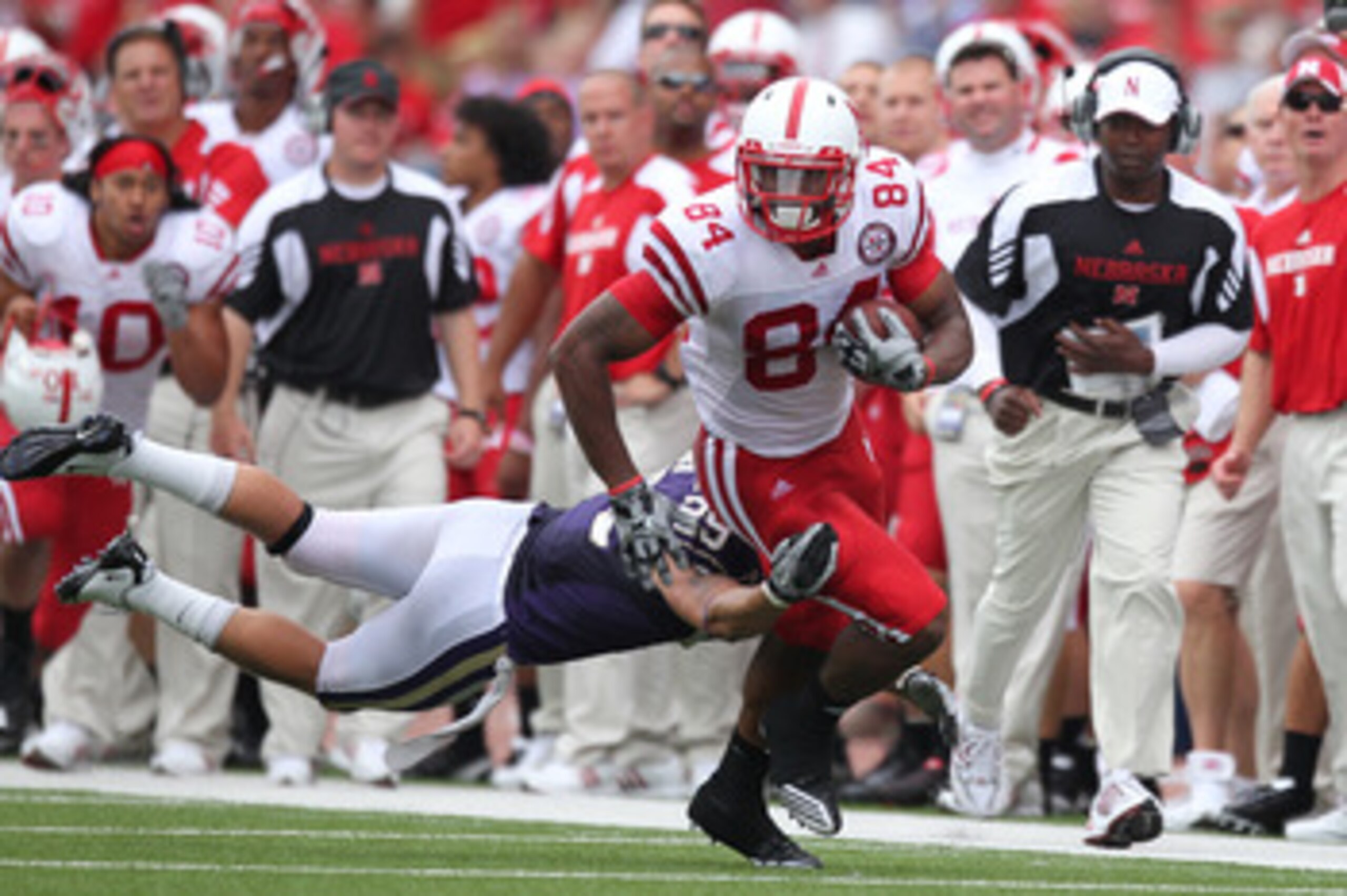 SEATTLE - SEPTEMBER 18: Wide receiver Brandon Kinnie #84 of the Nebraska Cornhuskers rushes against Nate Fellner #29 of the Washington Huskies on September 18, 2010 at Husky Stadium in Seattle, Washington. (Photo by Otto Greule Jr/Getty Images)