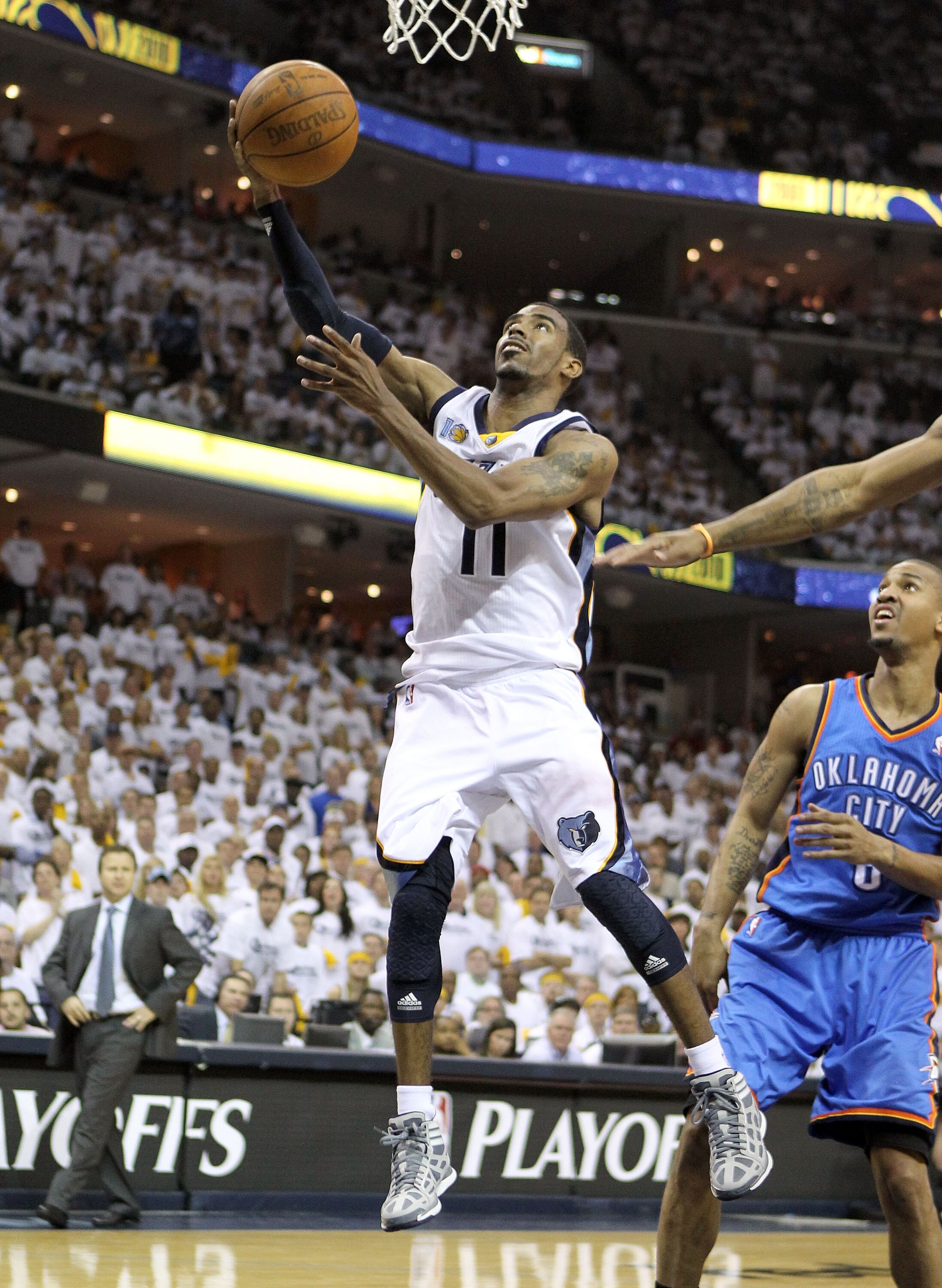 MEMPHIS, TN - MAY 07:  Mike Conley #11 of the  Memphis Grizzlies shoots the ball during the game against the Oklahoma City Thunder in Game Three of the Western Conference Semifinals in the 2011 NBA Playoffs at FedExForum on May 7, 2011 in Memphis, Tenness