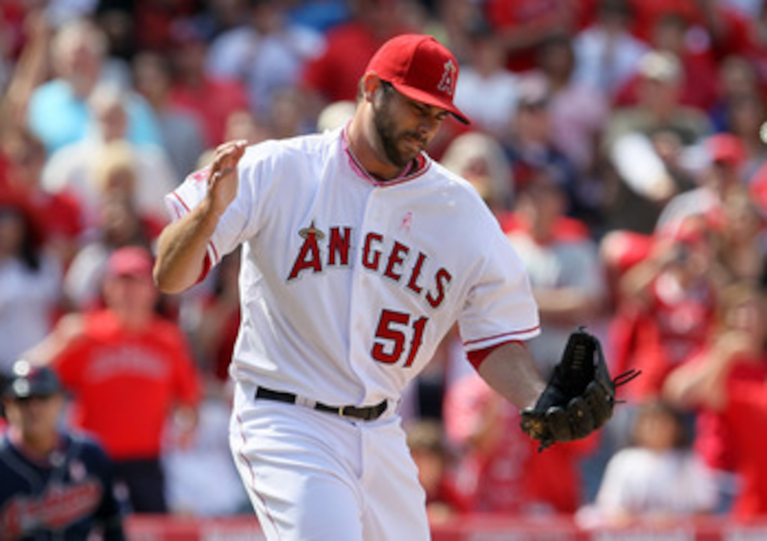 ANAHEIM, CA - MAY 8:  Pitcher Jordan Walden #51 of the Los Angeles Angels of Anaheim celebrates after getting the last out of the game and picking up the save against the Cleveland Indians on May 8, 2011 at Angel Stadium in Anaheim, California. The Angels