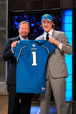 NEW YORK, NY - APRIL 28:  NFL Commissoner Roger Goodell (L) poses for a photo with Blaine Gabbert, #11 overall pick by the Jacksonville Jaguars, holds up a jersey during the 2011 NFL Draft at Radio City Music Hall on April 28, 2011 in New York City.  (Pho