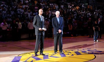 LOS ANGELES, CA - JUNE 06:  NBA legends Kareem Abdul-Jabbar and Bill Walton pause for a moment of silence to honor former UCLA head basketball coach John Wooden who passed away before Game Two of the 2010 NBA Finals betwen the Boston Celtics and the Los A