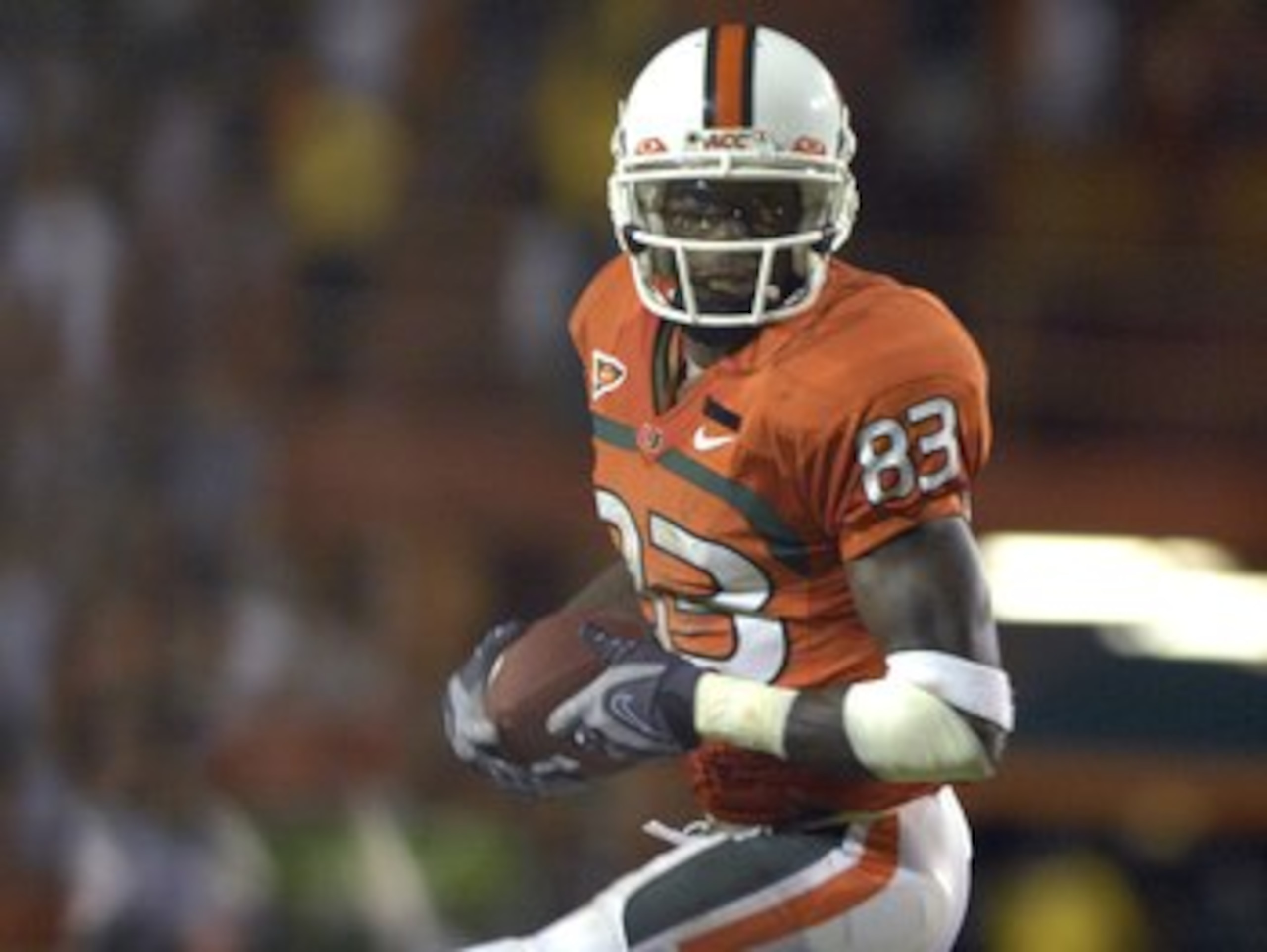 MIAMI, FL - SEPTEMBER 20: Split end Sam Shields #83 of  the University of Miami Hurricanes rushes upfield with a pass against the Texas A&M Aggies at the Orange Bowl on September 20, 2007 in Miami, Florida.  Miami won 31-17.  (Photo by Al Messerschmidt/Ge