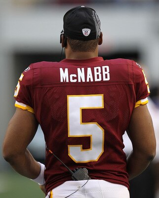 ARLINGTON, TX - DECEMBER 19:  Quarterback Donovan McNabb #5  of the Washington Redskins on the sidelines against play against the Dallas Cowboys at Cowboys Stadium on December 19, 2010 in Arlington, Texas.  (Photo by Ronald Martinez/Getty Images)